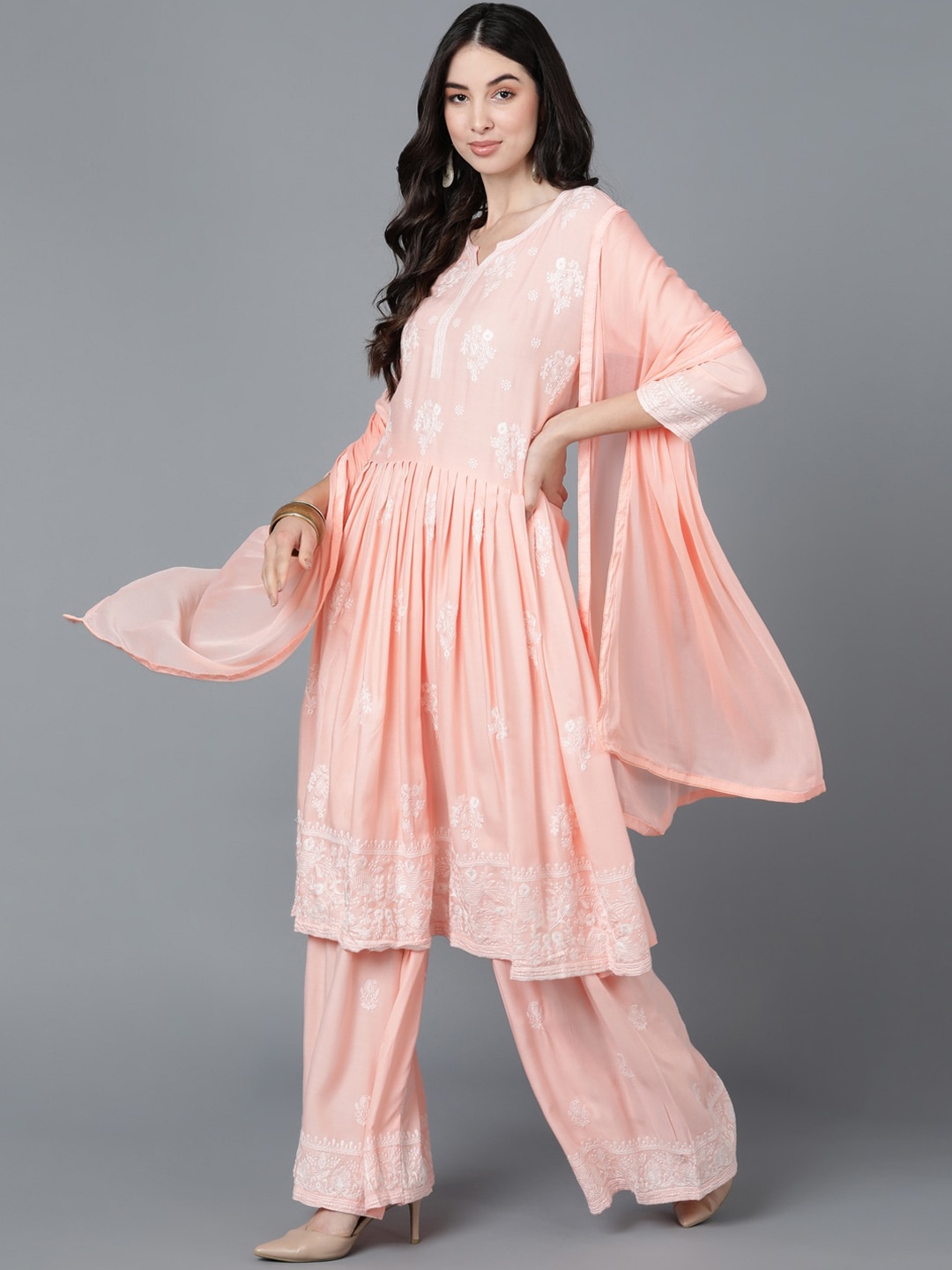 

AHIKA Women Peach-Coloured Yoke Design Pleated Kurti with Trousers & With Dupatta