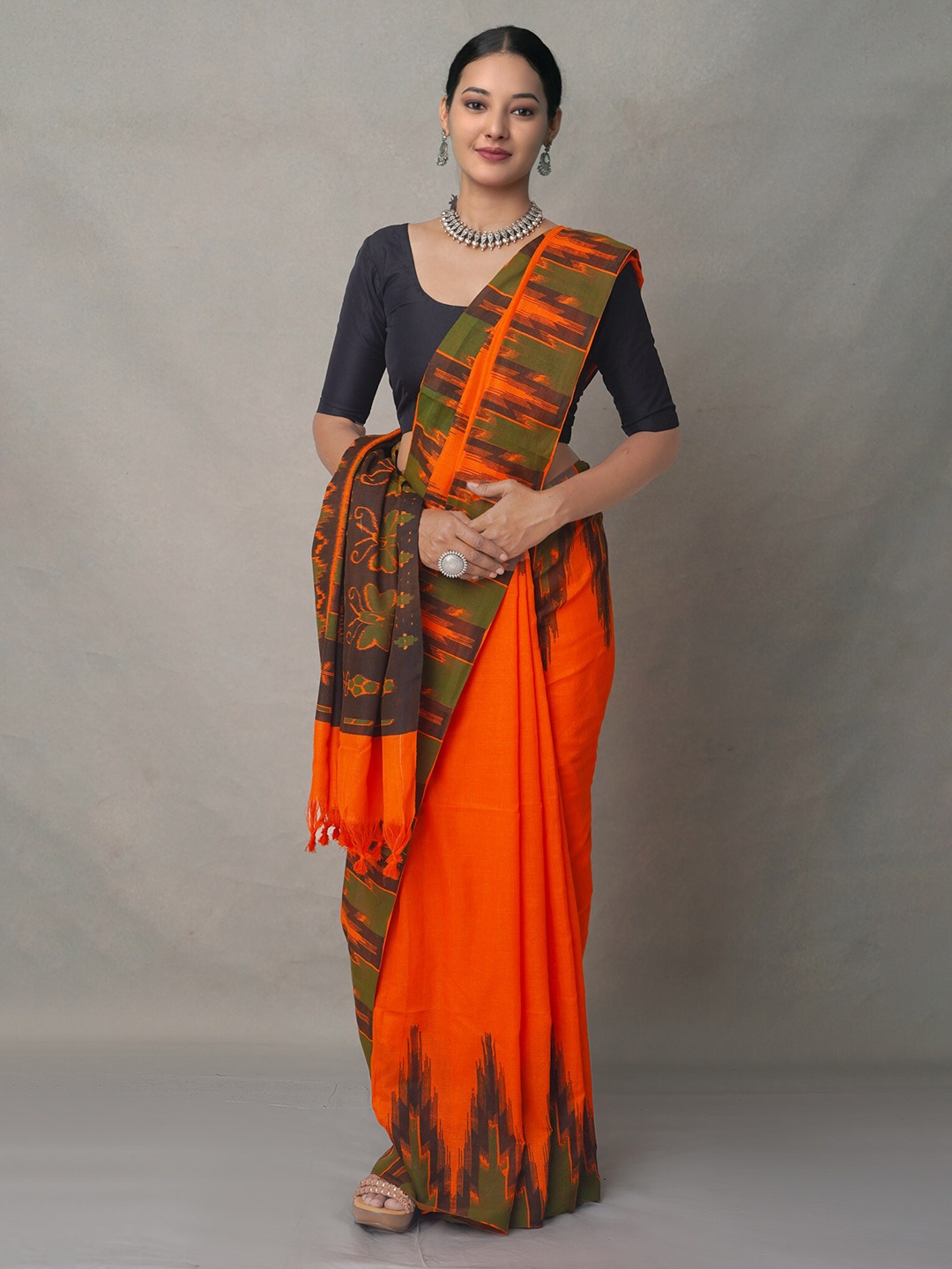 

Unnati Silks Orange Tie and Dye Pure Linen Jamdani Saree