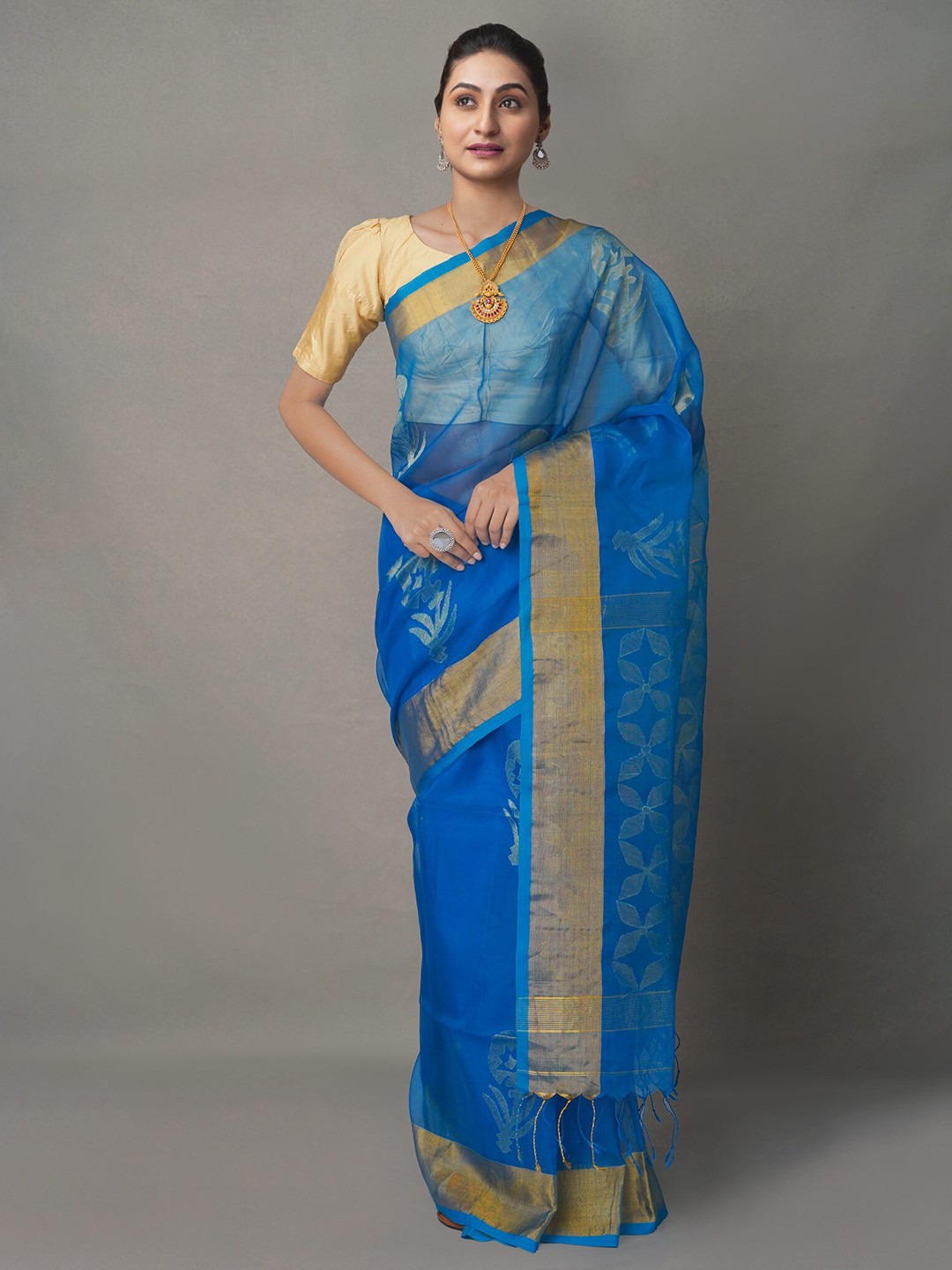 

Unnati Silks Blue & Gold-Toned Ethnic Motifs Zari Silk Cotton Jamdani Saree