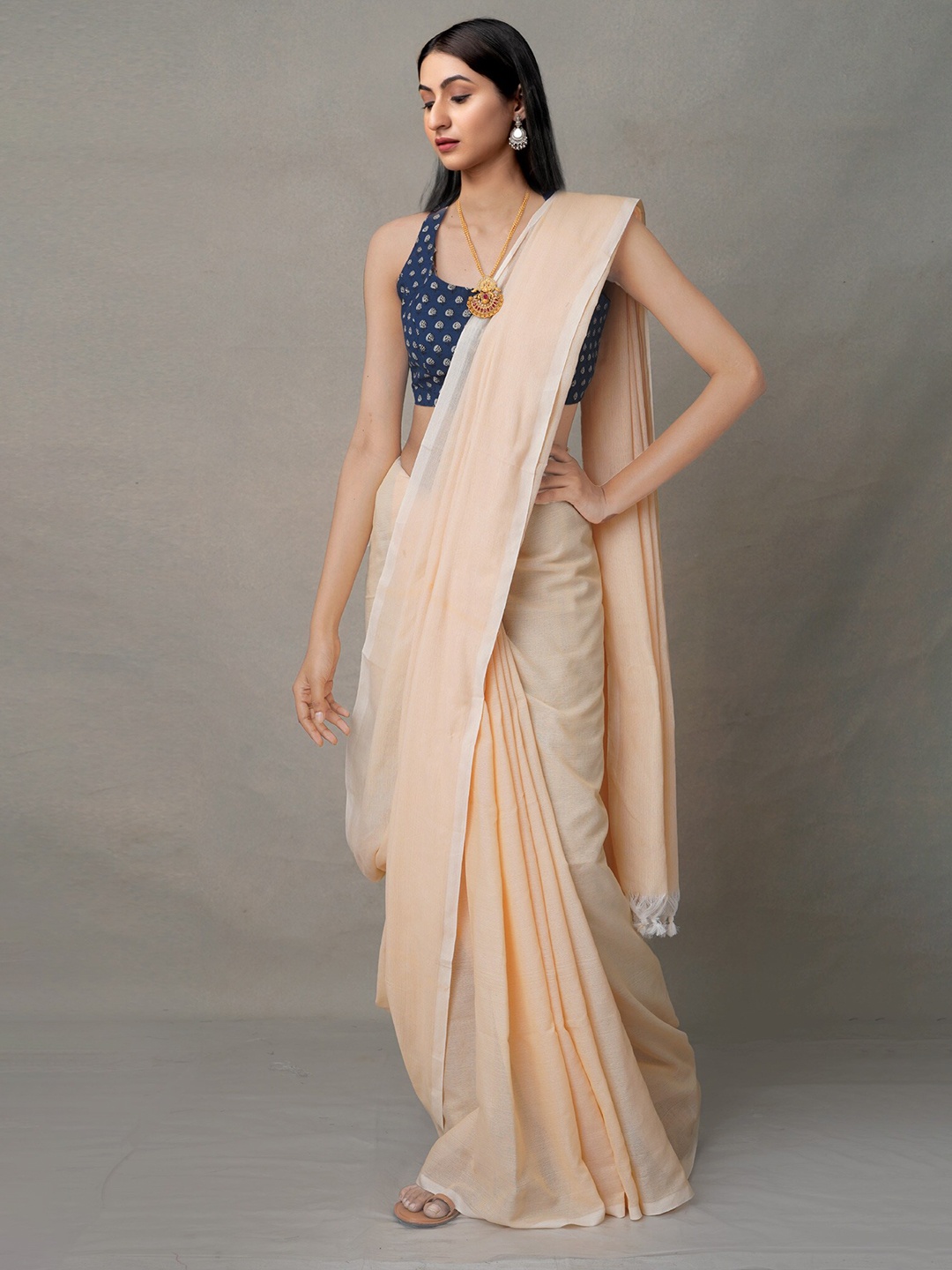 

Unnati Silks Cream-Coloured Pure Linen Jamdani Saree