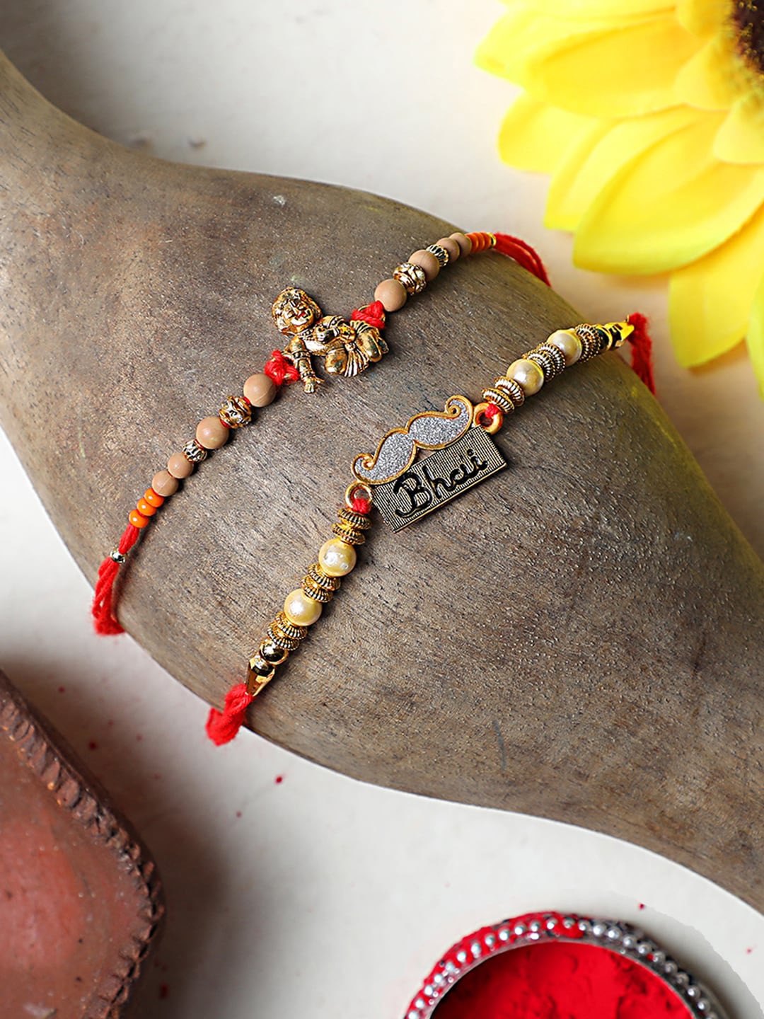 

ANIKAS CREATION Red Rakhi With Greeting Card, Roli Chawal, Chandan and Mishri