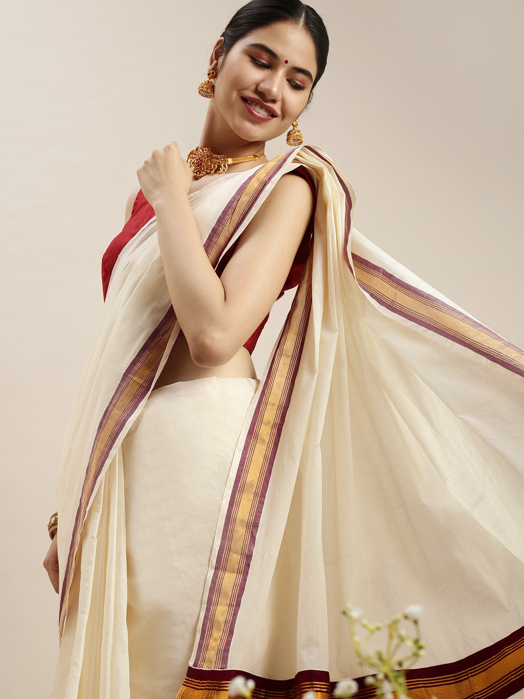 

Thara Sarees Off White & Red Pure Cotton Kasavu Saree