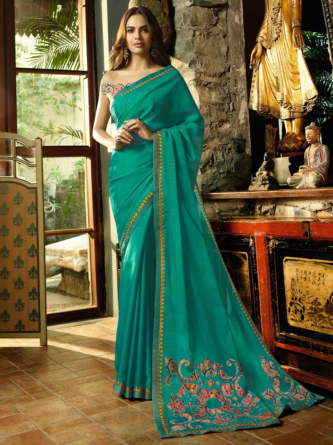 

Shaily Sea Green & Yellow Ethnic Motifs Embroidered Satin Saree