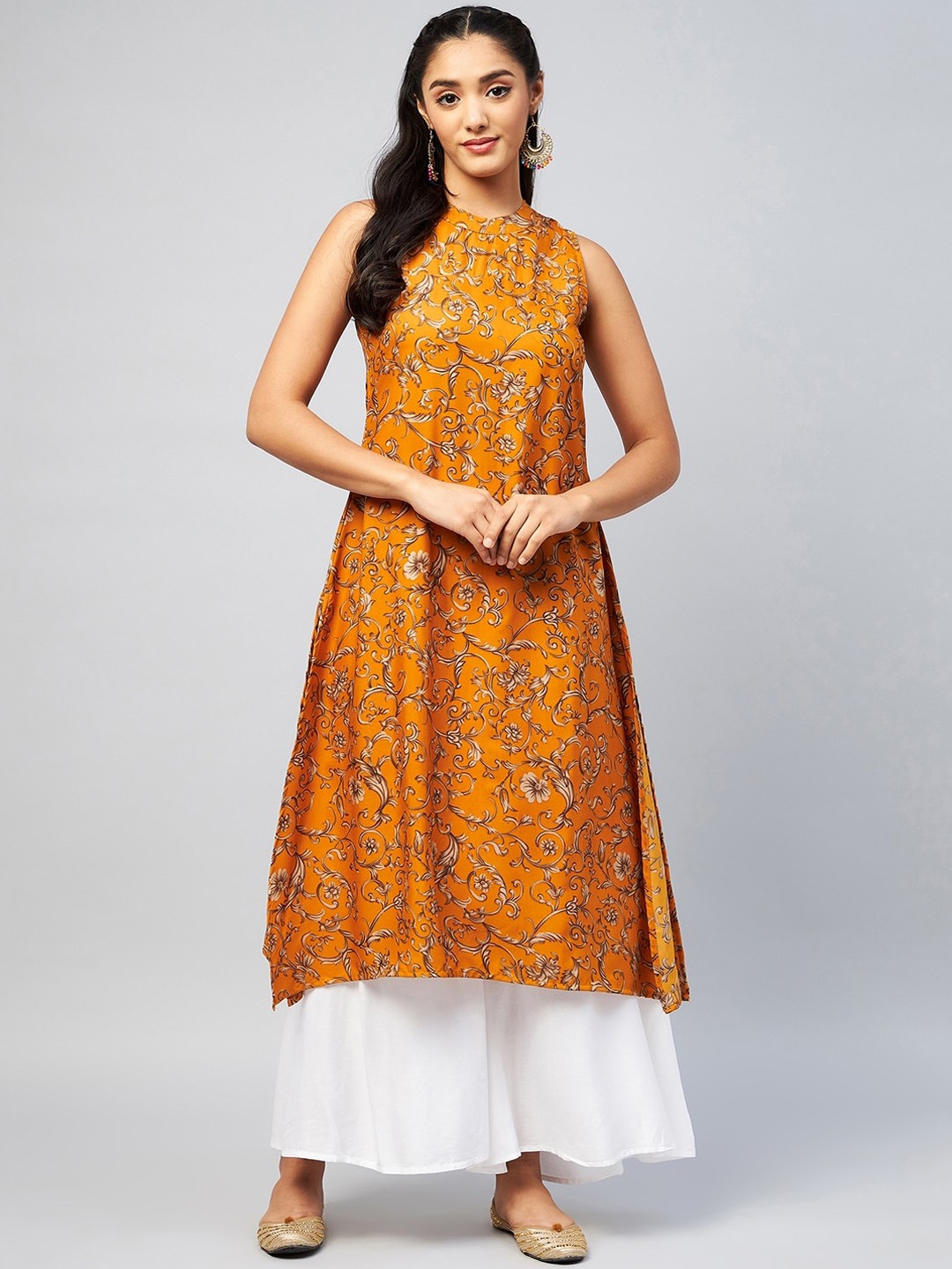 

InWeave Women Mustard Yellow Floral Printed Panelled Kurti with Skirt
