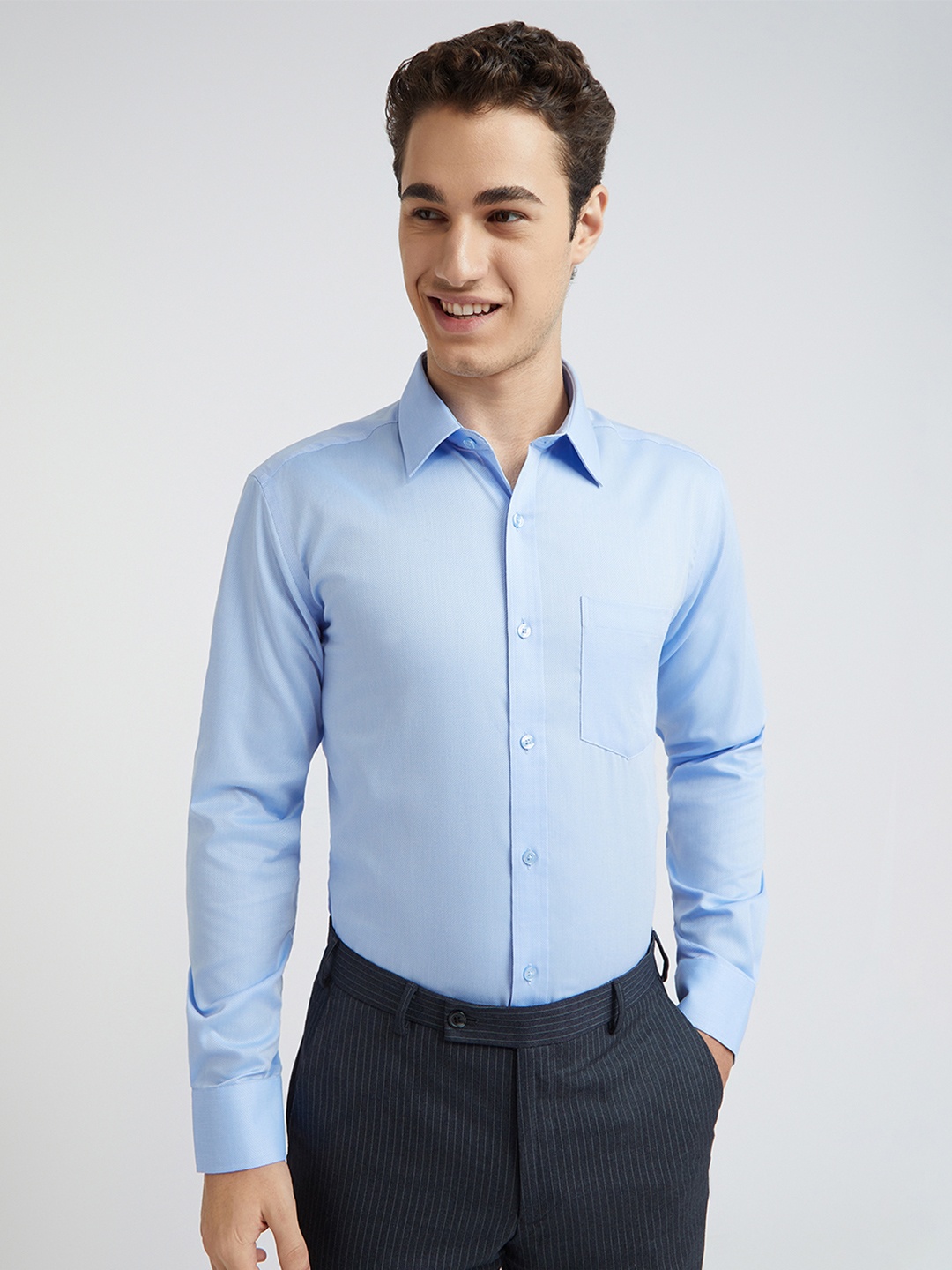 

Park Avenue Men Blue Regular Fit Solid Formal Shirt