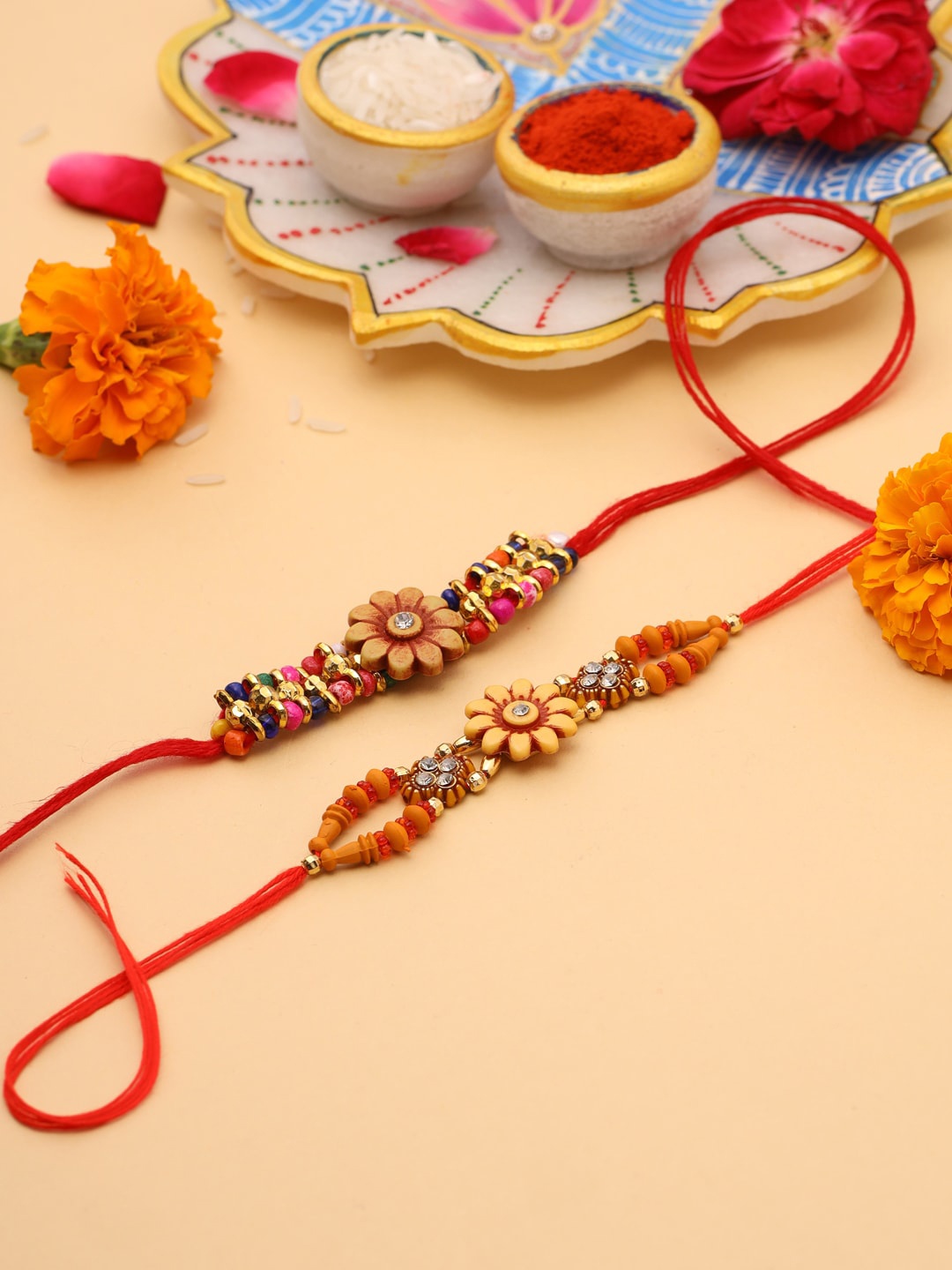 

Natures Buggy Men Set Of 2 Stone-Studded & Beaded Thread Rakhi, Red