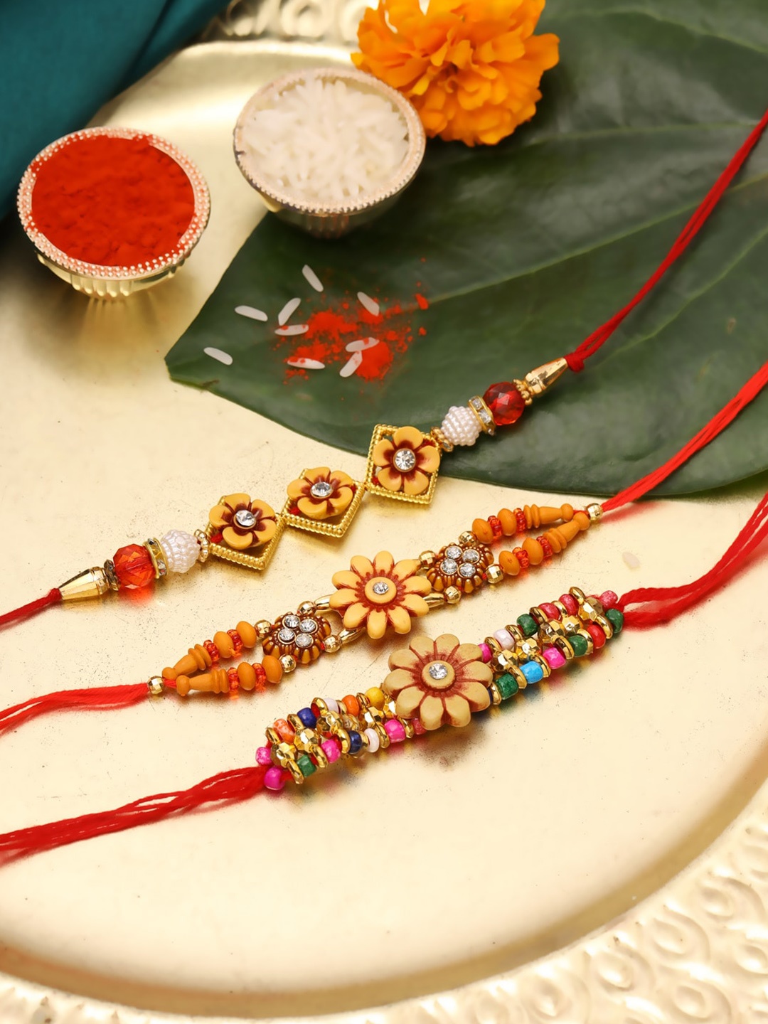 

Natures Buggy Men Set Of 3 Red Beaded Thread Rakhi