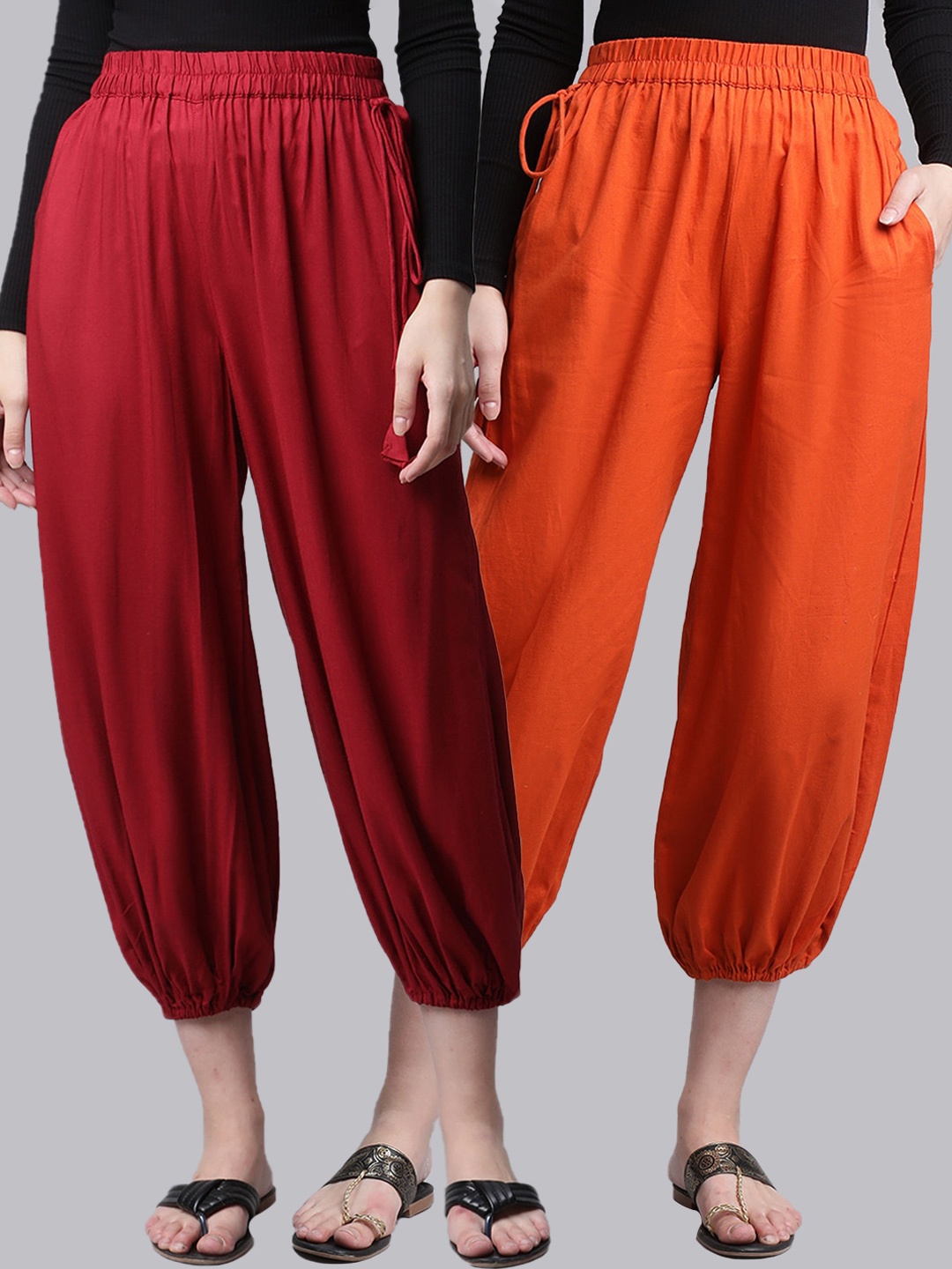 

Molcha Women Pack Of 2 Orange & Rust Loose Fit Solid Pure Cotton Ankle Length Salwar