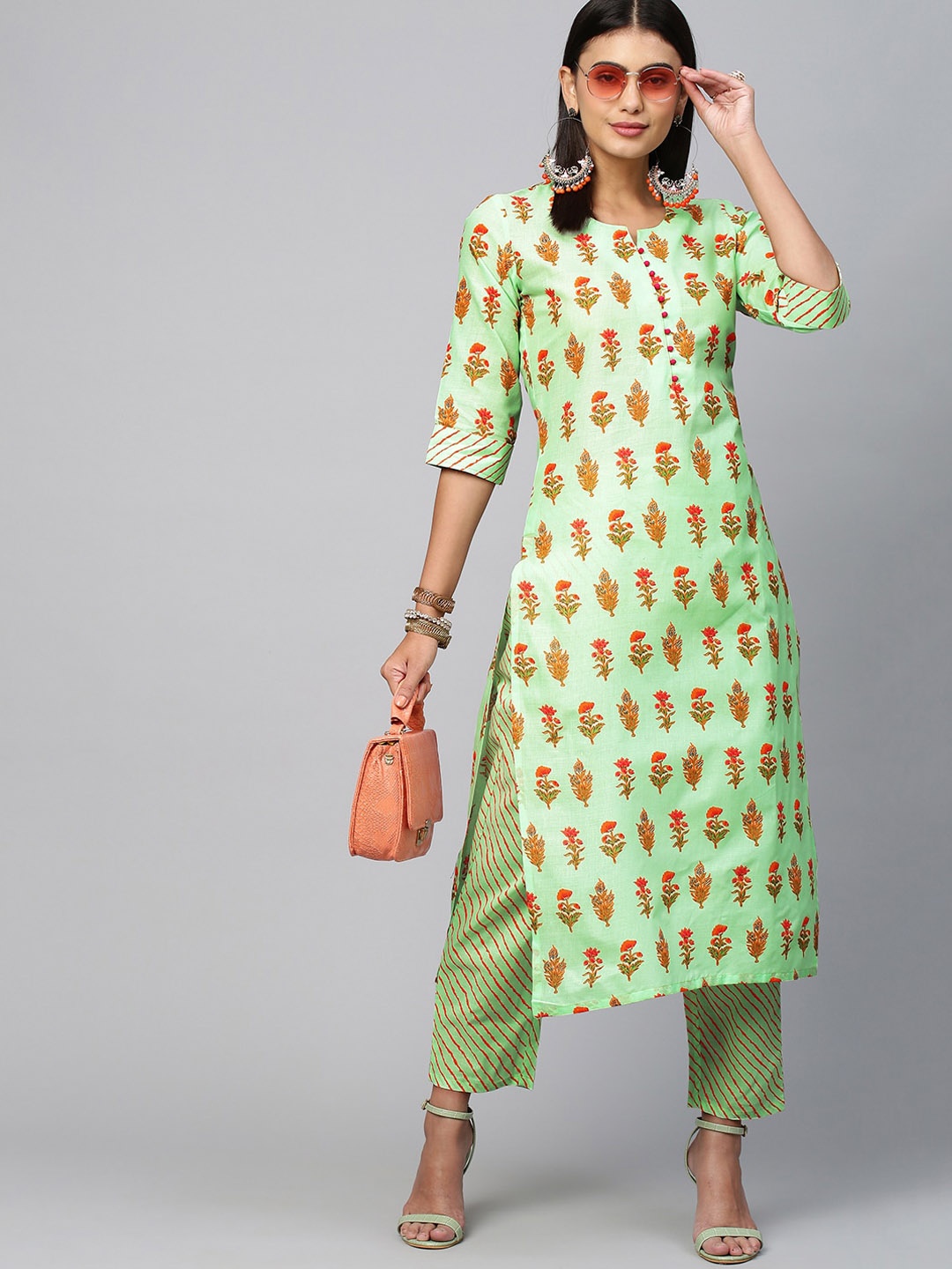 

KALINI Women Green Floral Printed Panelled Kurti with Trousers