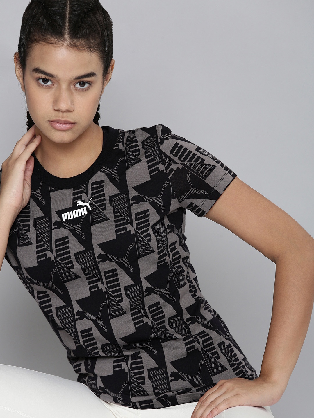 

Puma Women Black & Grey Brand Logo Printed Pure Cotton T-shirt