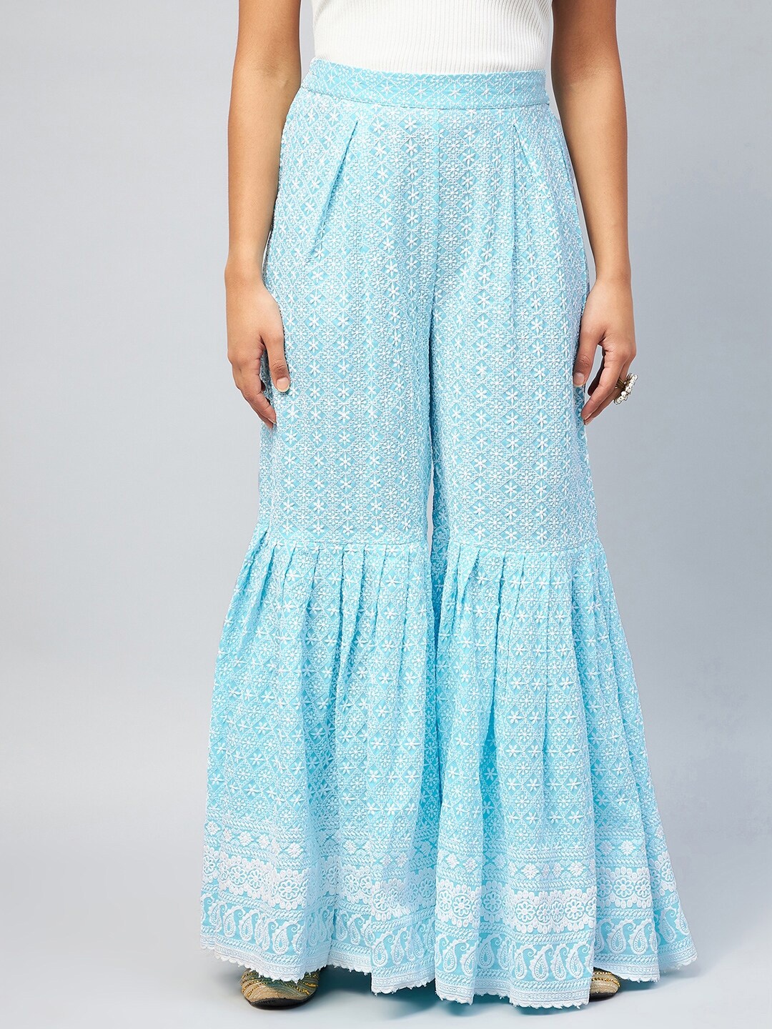 

InWeave Women Blue & White Floral Embroidered Flared Palazzos