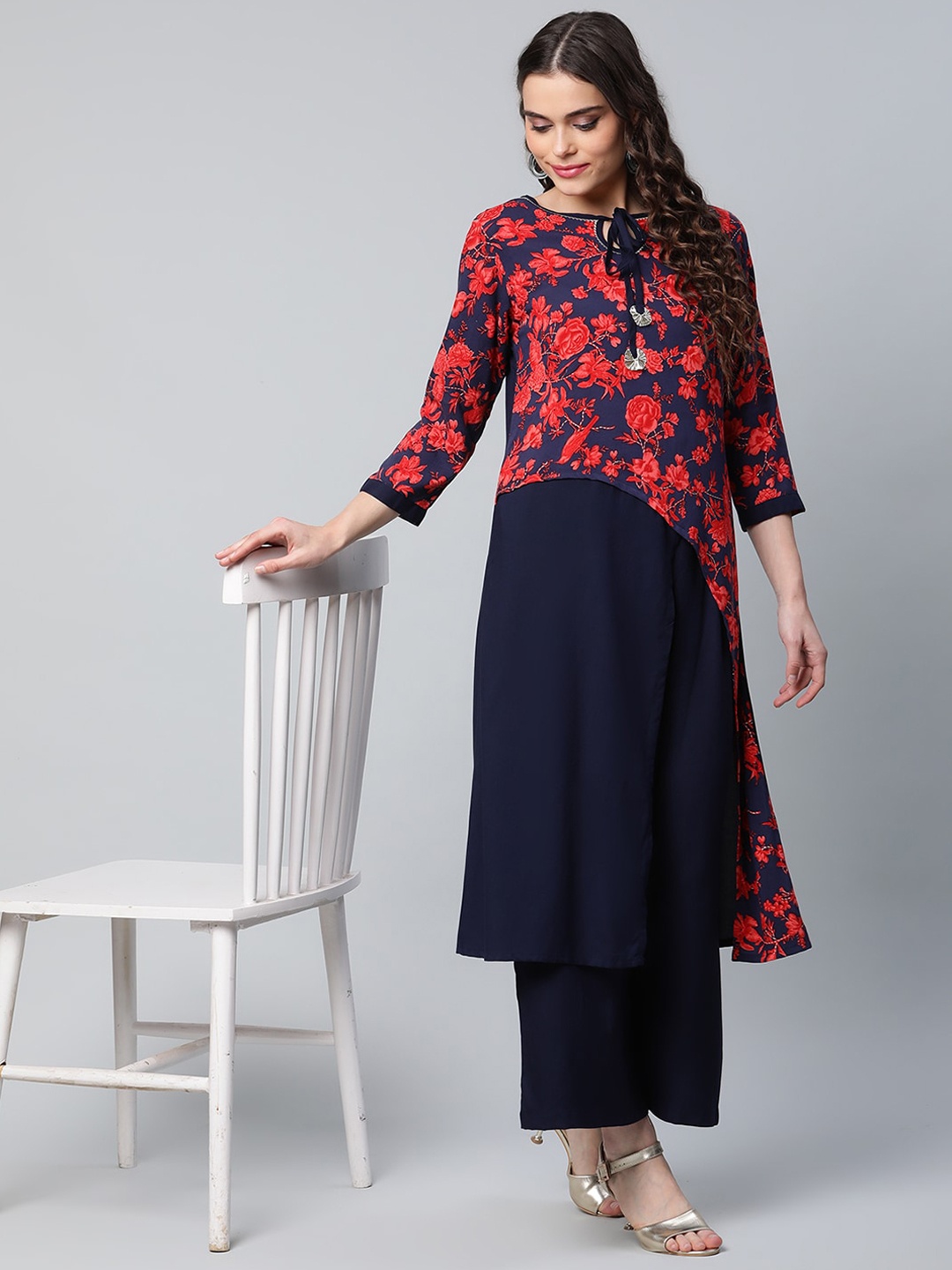 

Ahalyaa Women Navy Blue Floral Printed High Slit Gotta Patti Kurti with Palazzos