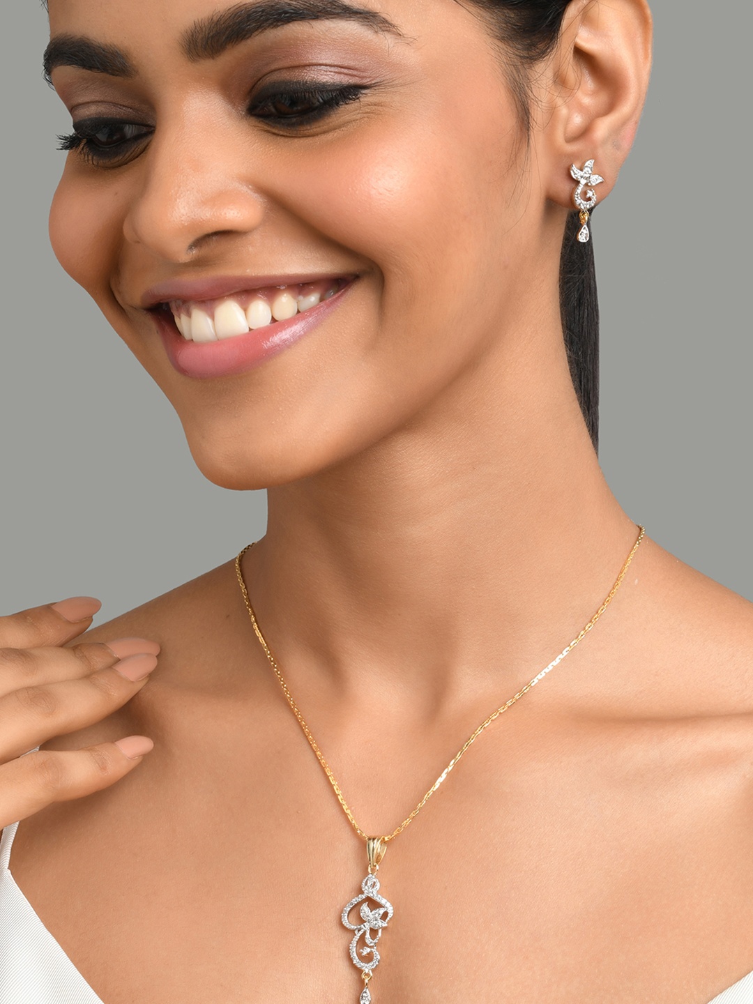 

Fida Gold-Plated White AD-Studded Jewellery Set