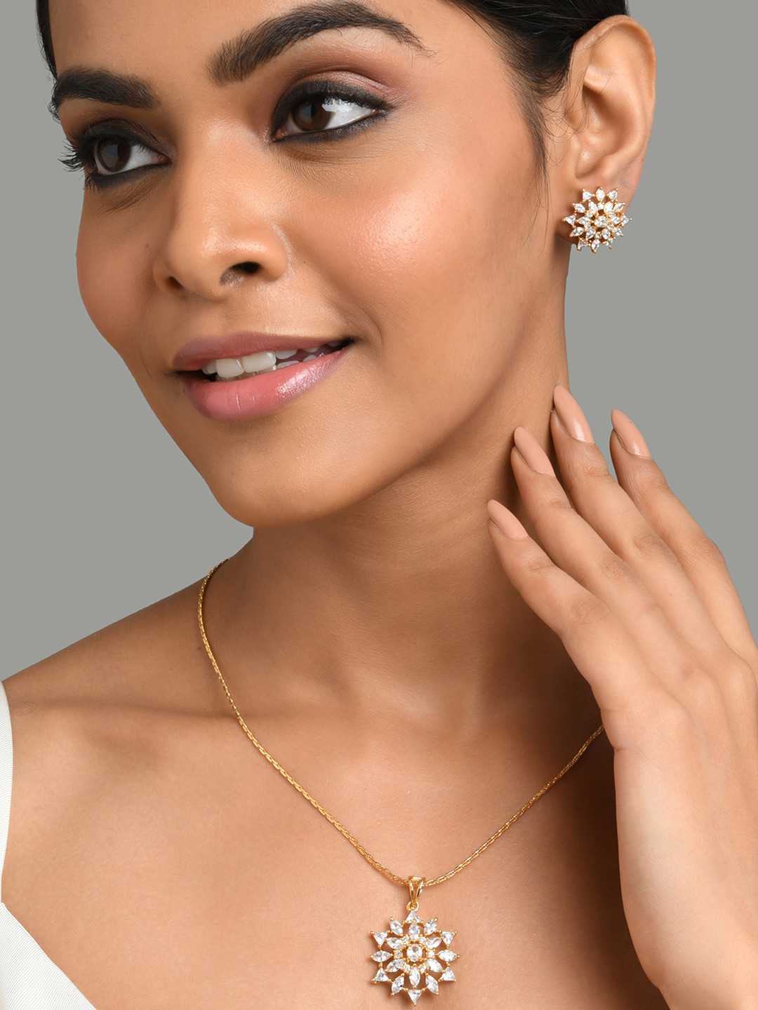 

Fida Gold-Plated White AD-Studded Jewellery Set