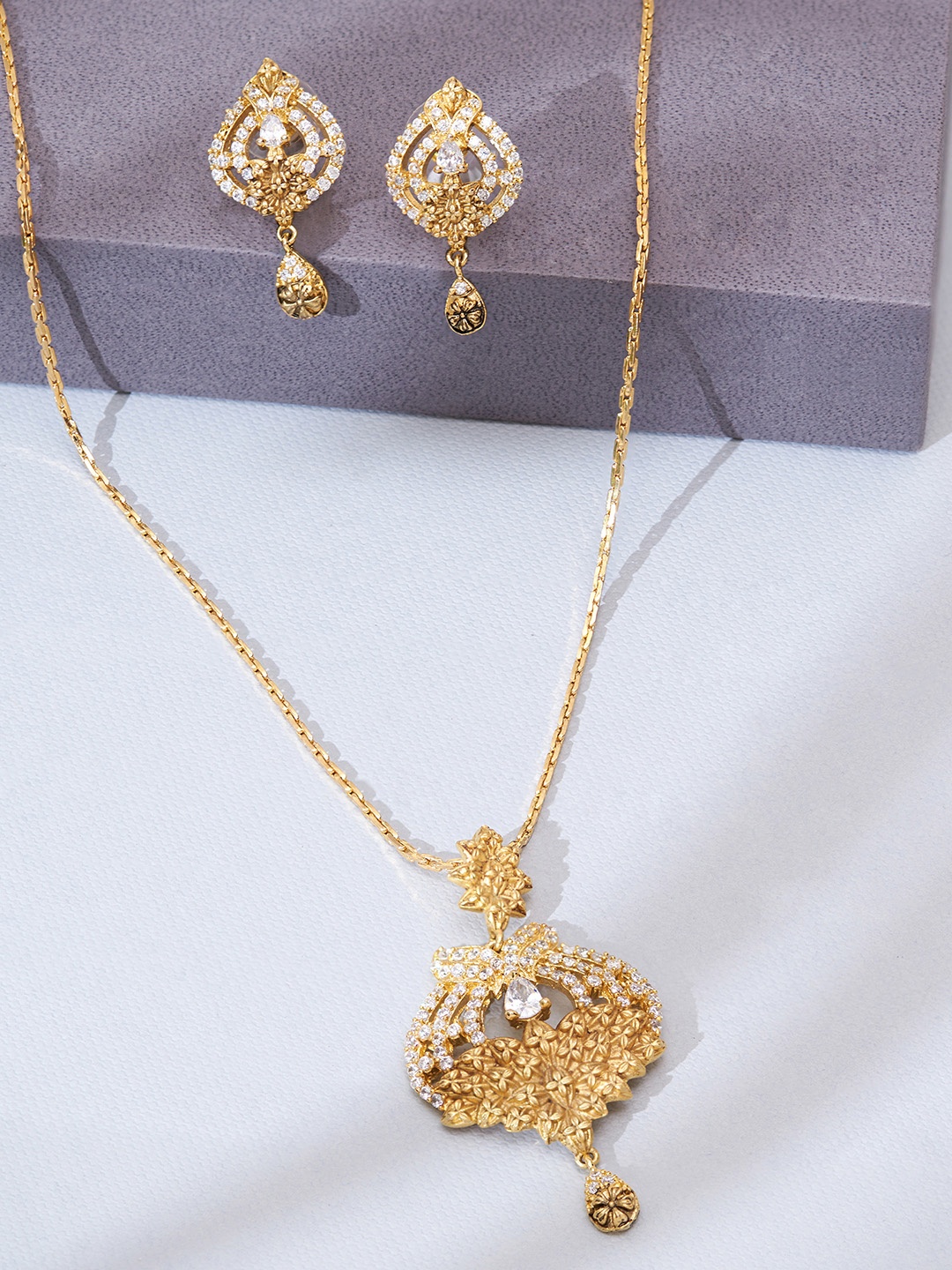 

Fida Gold Plated White AD Studded Jewellery Set