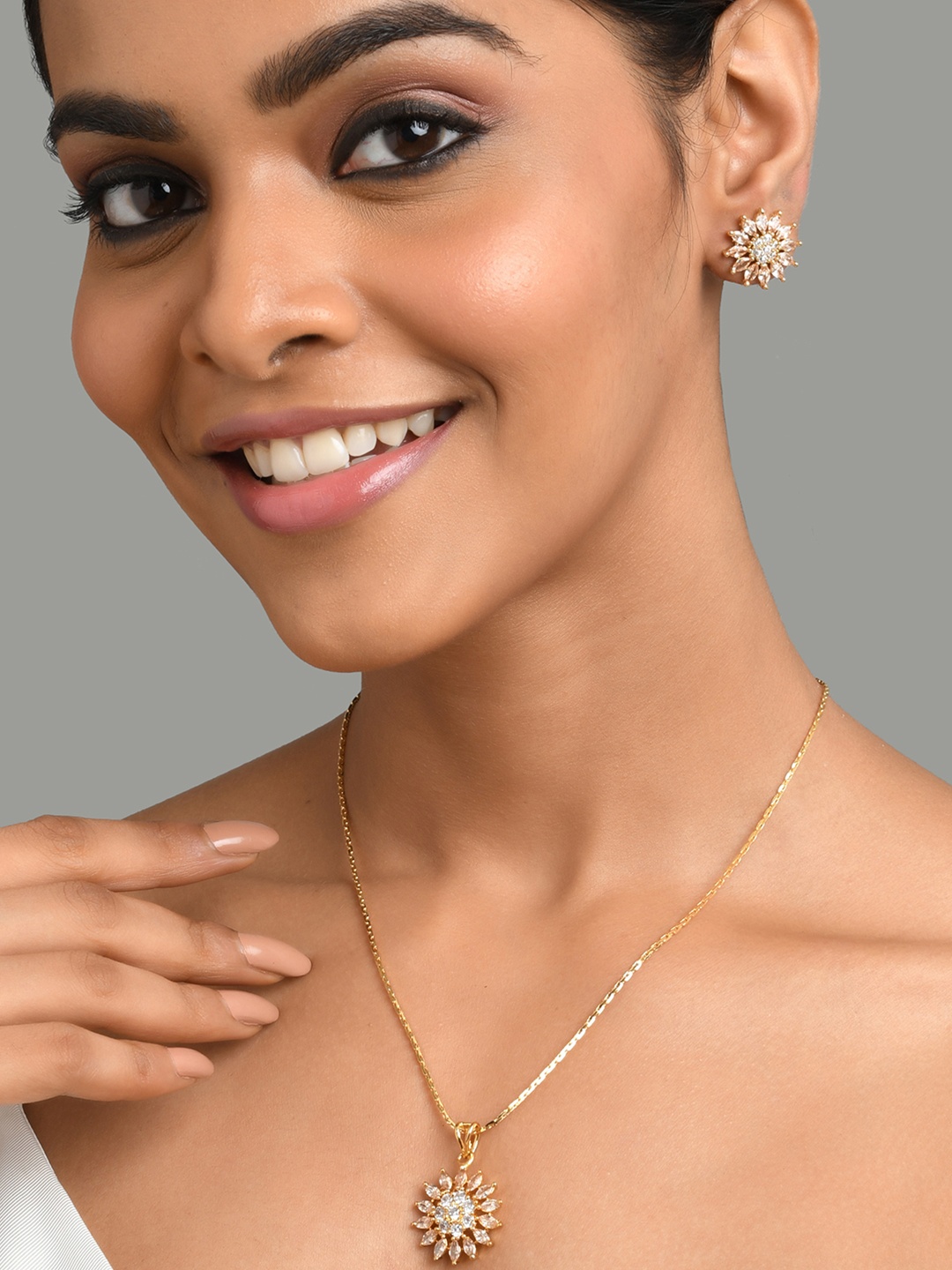 

Fida Gold-Plated AD-Studded Gold Pendant & Earring Set