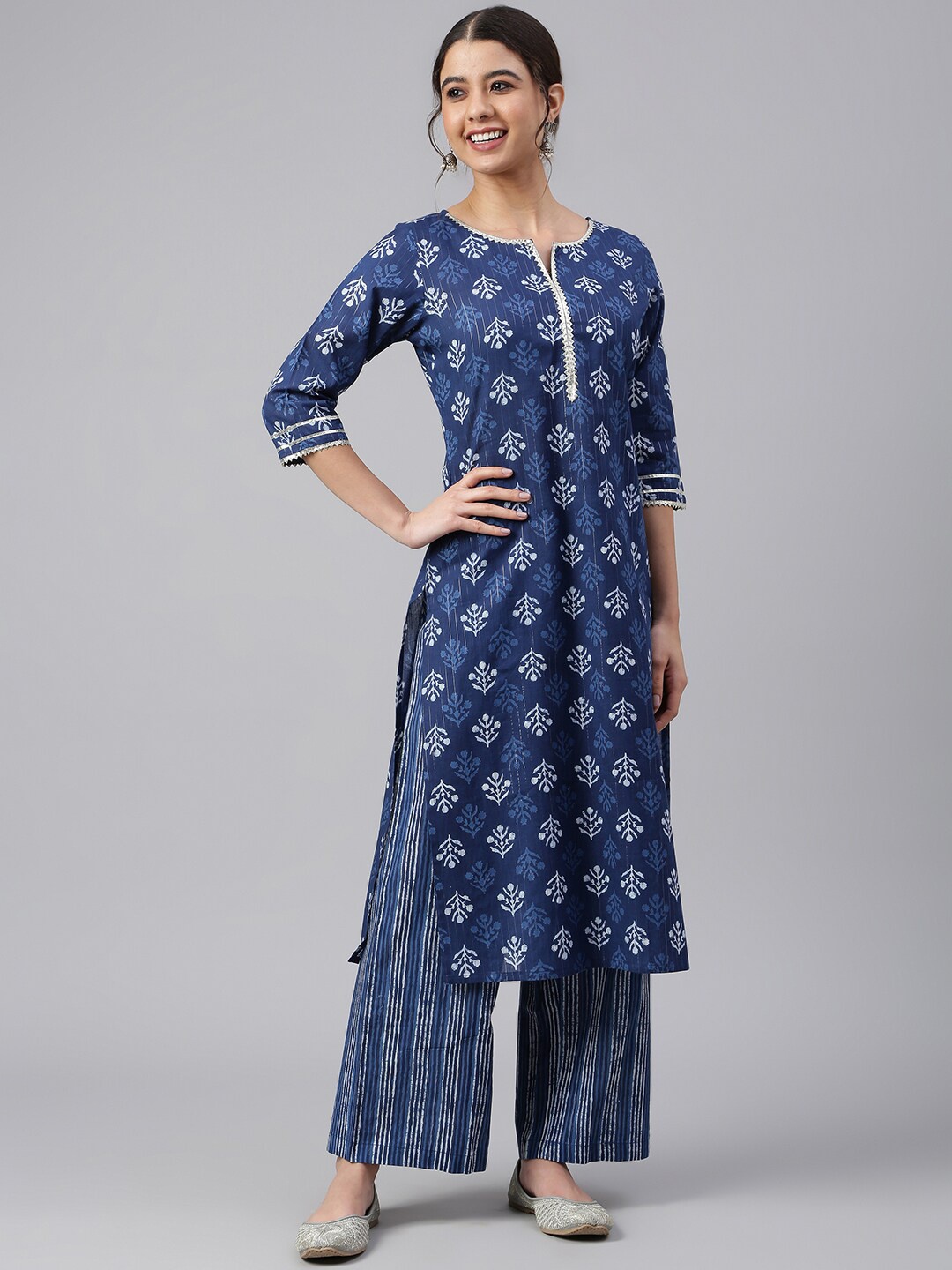 

Janasya Women Navy Blue Cotton Block Print Kurta with Palazzo