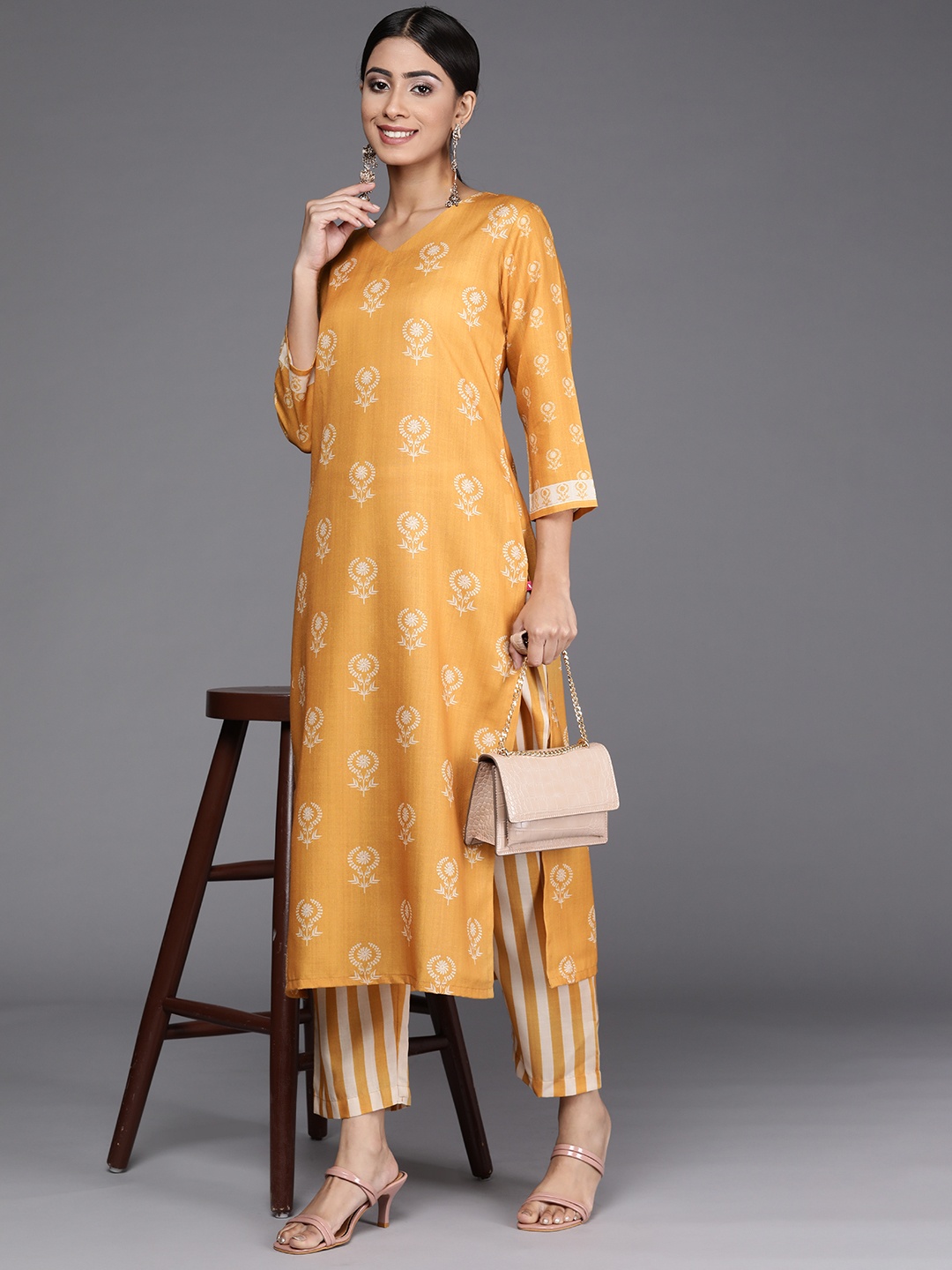 

Varanga Women Mustard Yellow & Off-White Ethnic Motifs Printed Kurta with Trousers