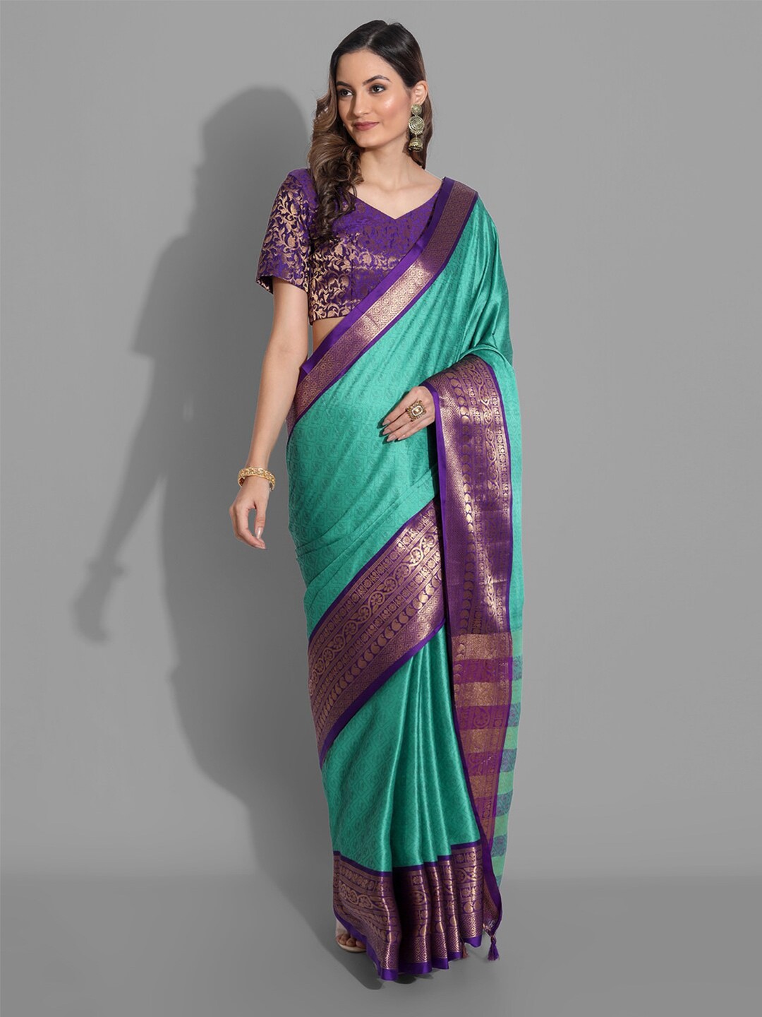 

Mitera Fluorescent Green & Purple Woven Design Zari Dharmavaram Saree