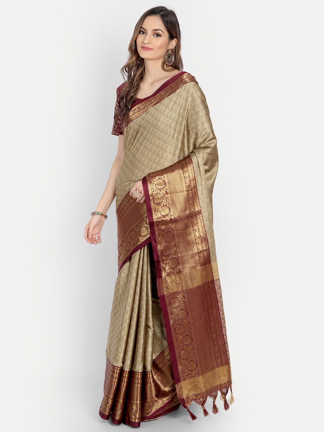 

Mitera Beige & Maroon Ethnic Motifs Zari Dharmavaram Saree