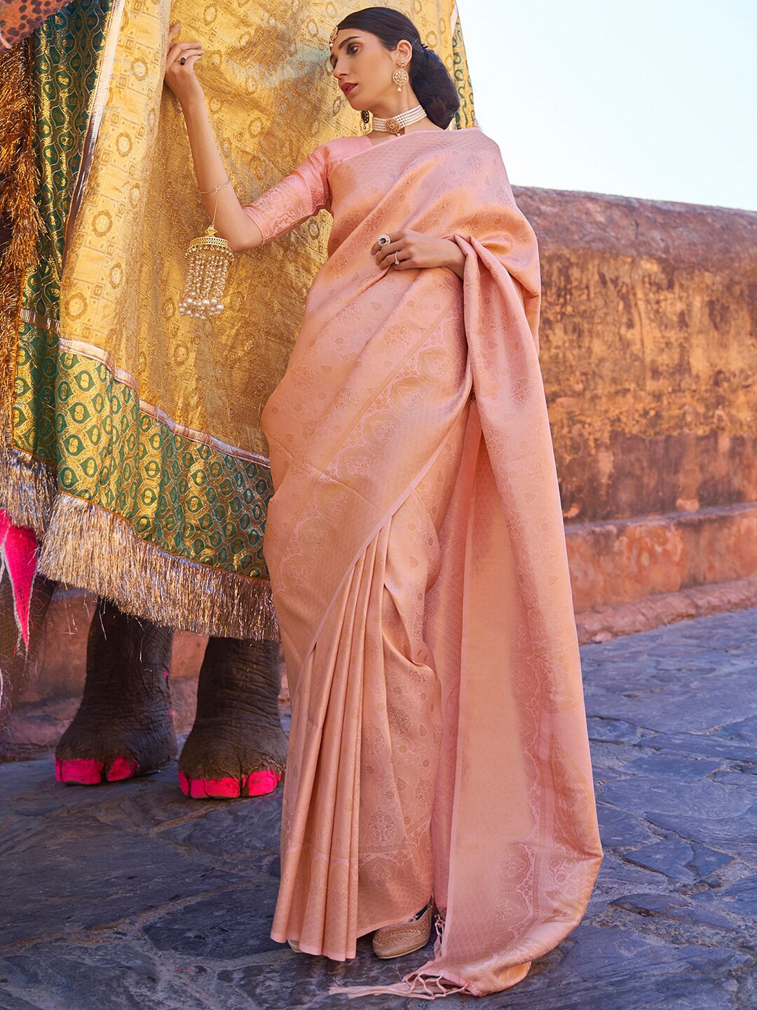 

Mitera Peach-Coloured & Gold-Toned Ethnic Motifs Zari Silk Blend Banarasi Saree