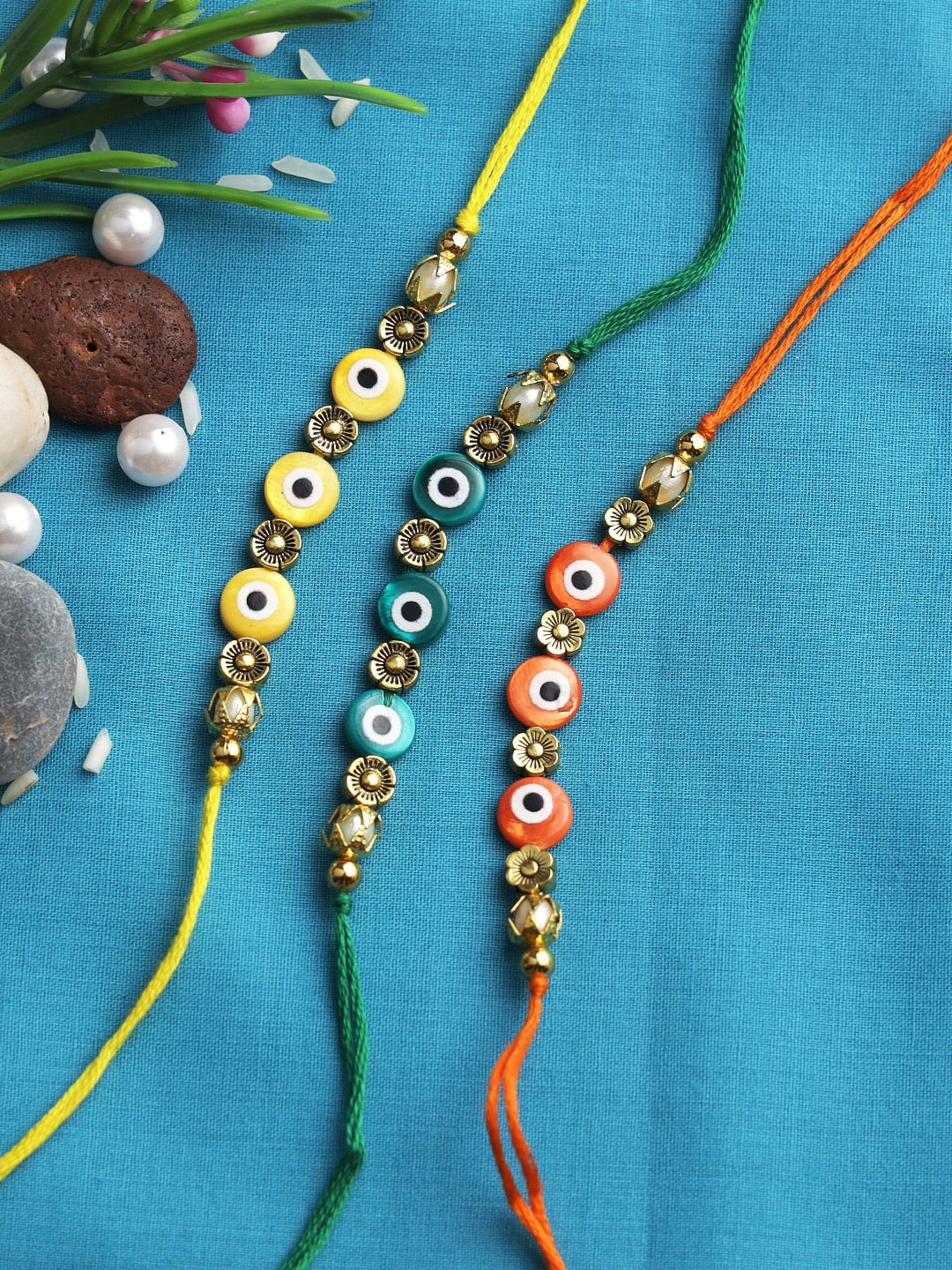 

Aapno Rajasthan Set of 3 Multicolored Evil Eye Thread Rakhi, Multi