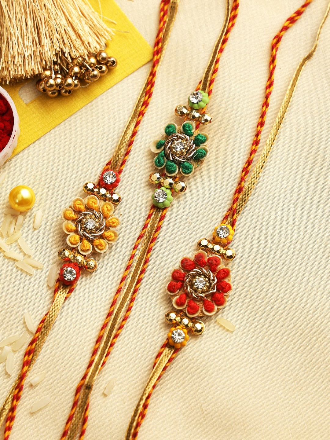 

Aapno Rajasthan Set of 3 Beaded Rakhi with Roli Chawal & Card, Multi