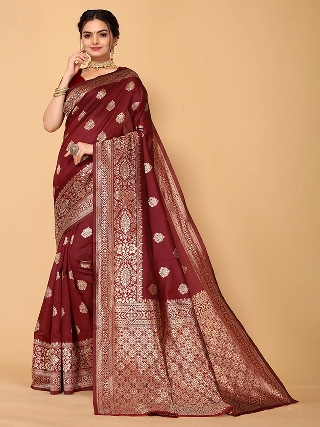 

Mitera Maroon & Gold-Toned Ethnic Motifs Zari Silk Blend Banarasi Saree