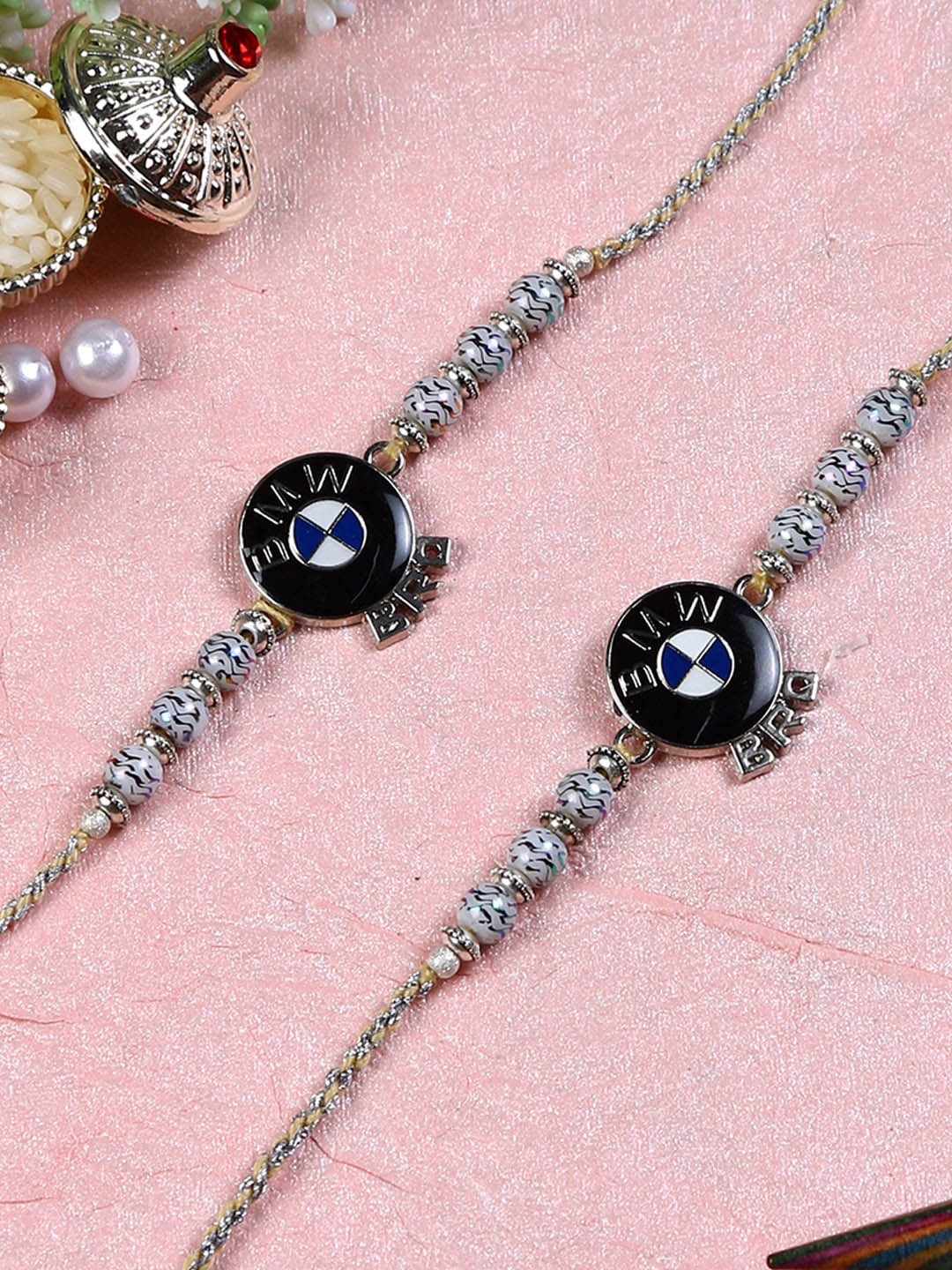 

AApno Rajasthan Set Of 2 Black & Silver-Toned & Beaded BMW Rakhis