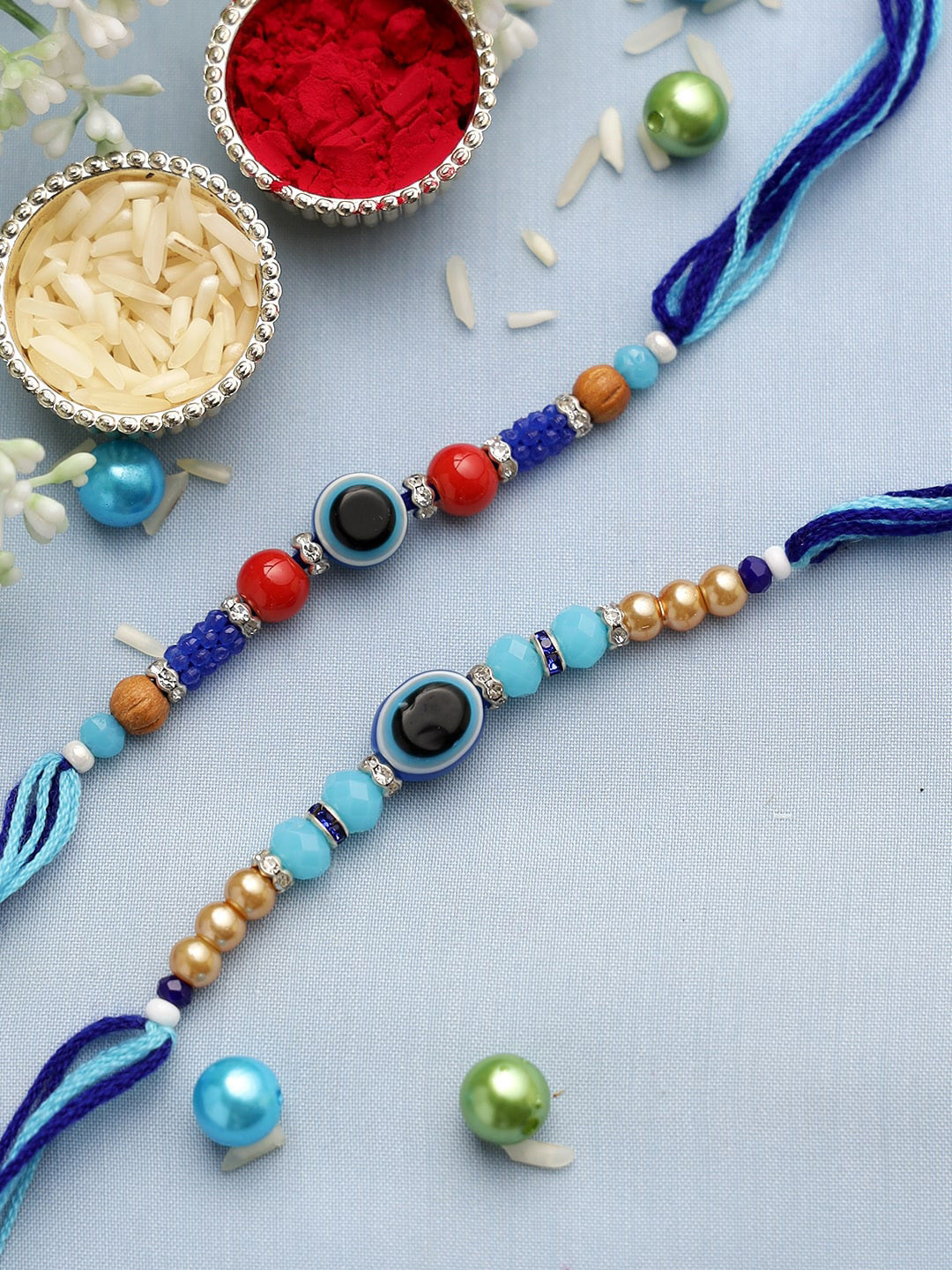 

Aapno Rajasthan Set of 2 Evil Eye Rakhis, Blue