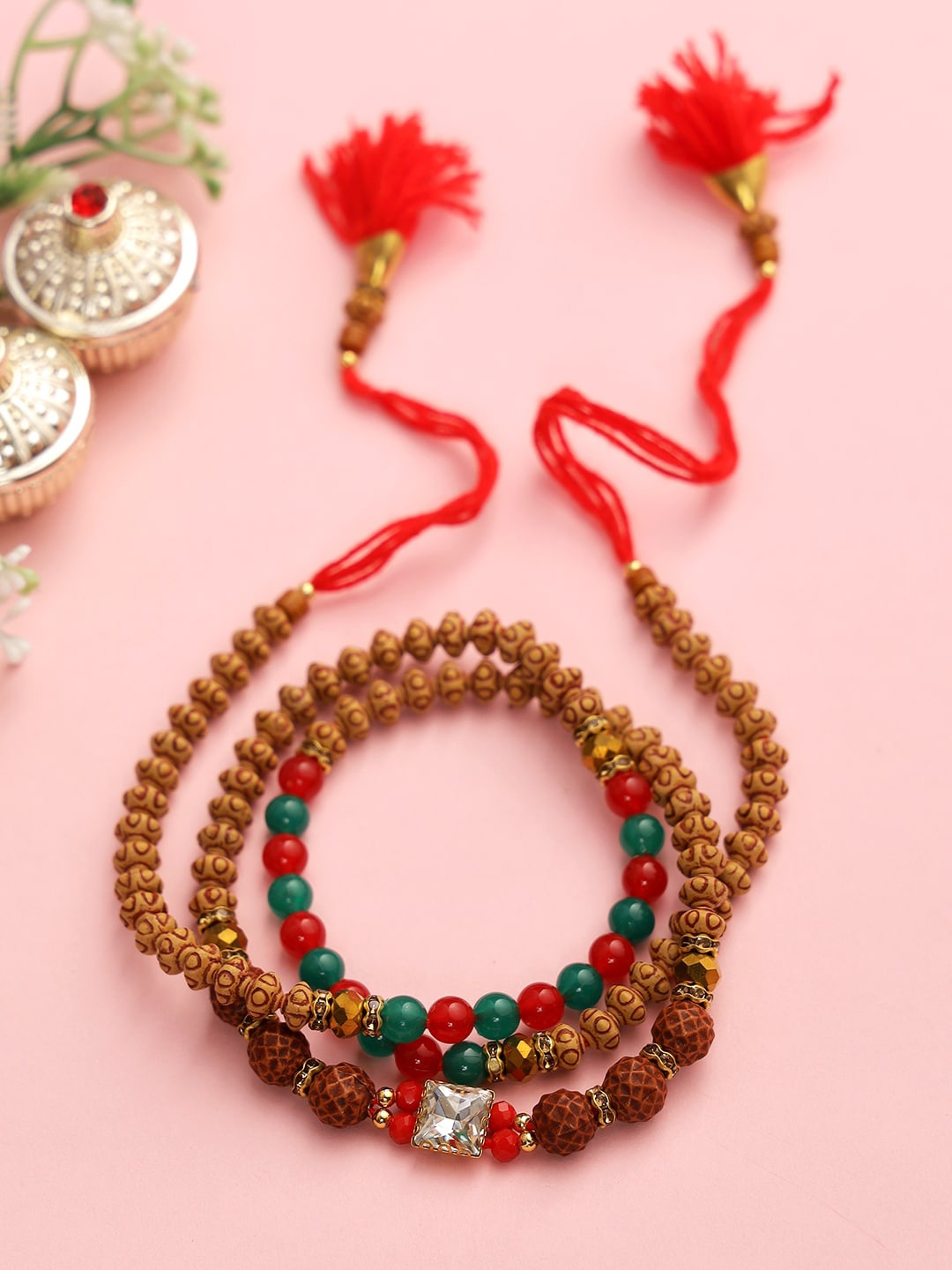 

Aapno Rajasthan Brown Artificial Rudraksh Beaded Bracelete Style Rakhi