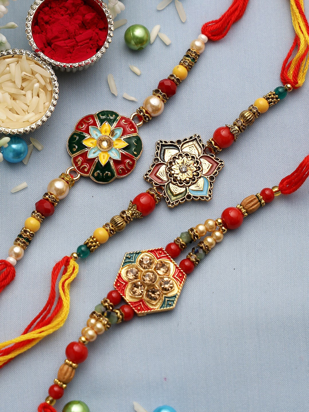 

Aapno Rajasthan Set of 3 Multicolored Meena Work Thread Rakhi, Multi