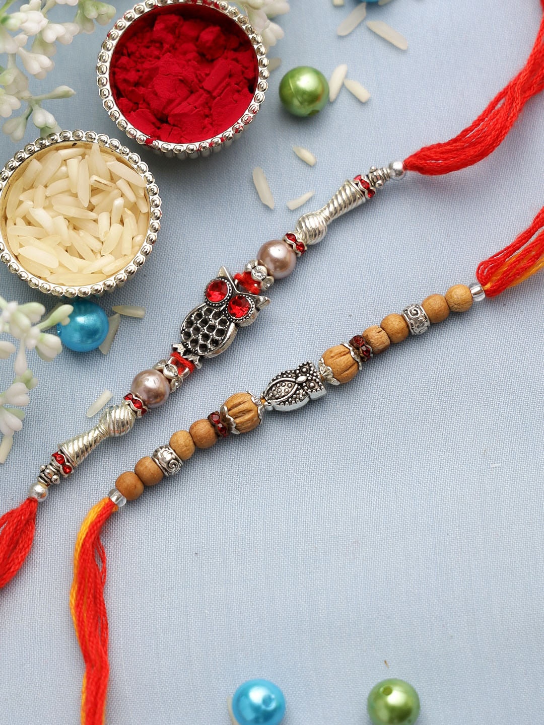 

Aapno Rajasthan Set of 2 Silver Owl Rakhis