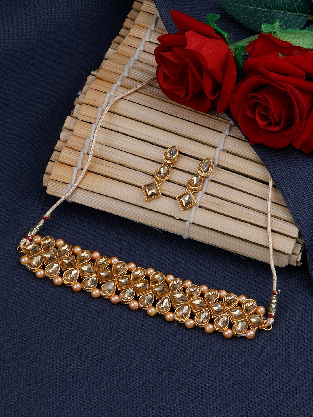 

Silver Shine Women Gold-Plated White Stone-Studded & Pearl Beaded Jewelry Set