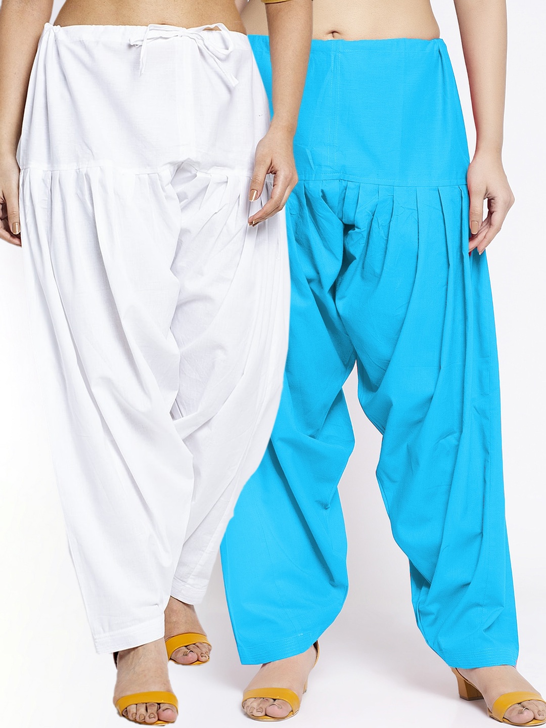 

Jinfo Women Pack of 2 White & Blue Solid Loose Fit Cotton Salwar