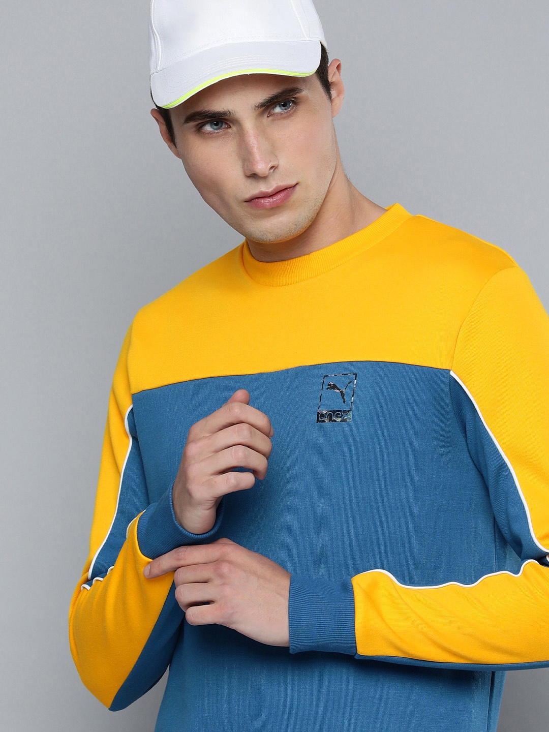 

one8 x PUMA Men Colourblocked Slim Fit Crew Sweatshirt, Blue