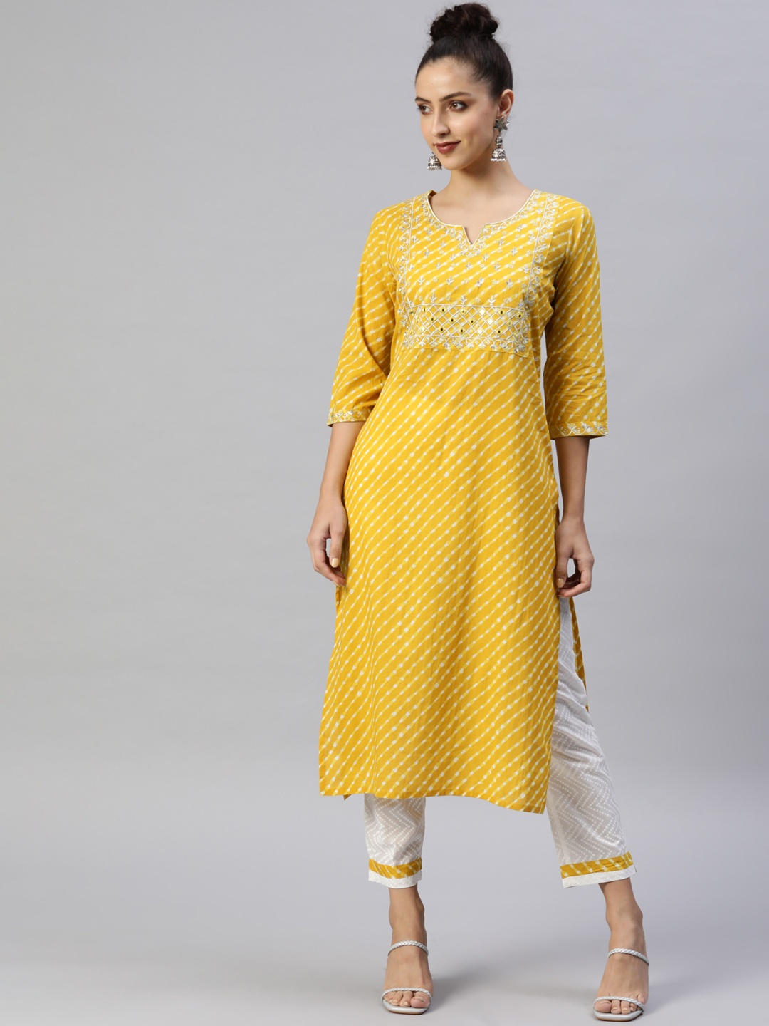 

Readiprint Fashions Women Yellow Ethnic Motifs Mirror Work Pure Cotton Kurta with Trousers