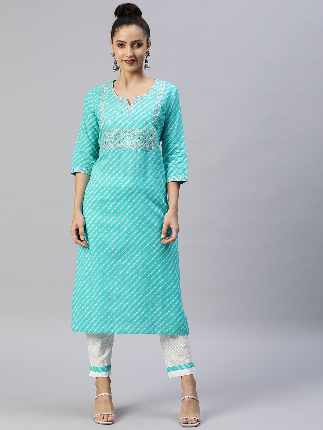 

Readiprint Fashions Women Turquoise Blue Ethnic Motifs Mirror Work Pure Cotton Kurta with Trousers