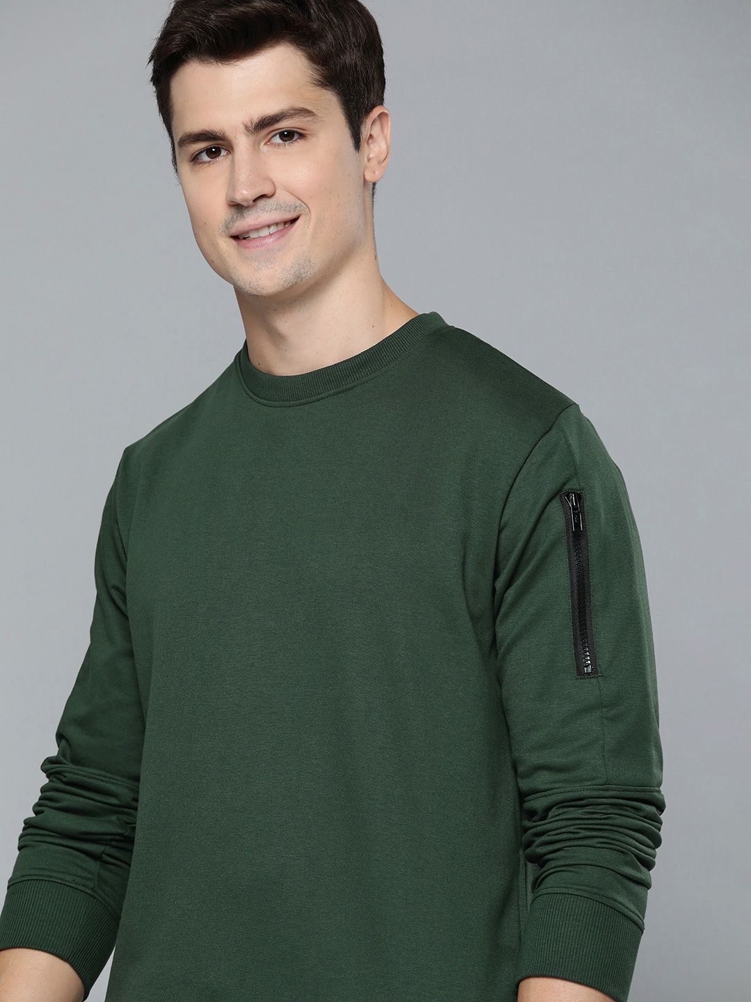 

Mast & Harbour Men Green Solid Sweatshirt