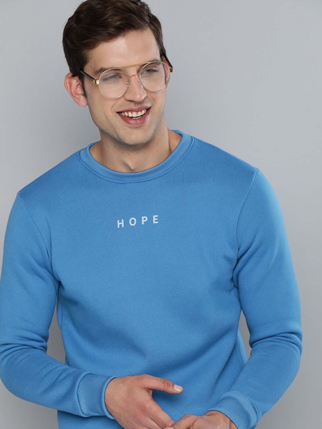 

Mast & Harbour Men Blue Solid Sweatshirt