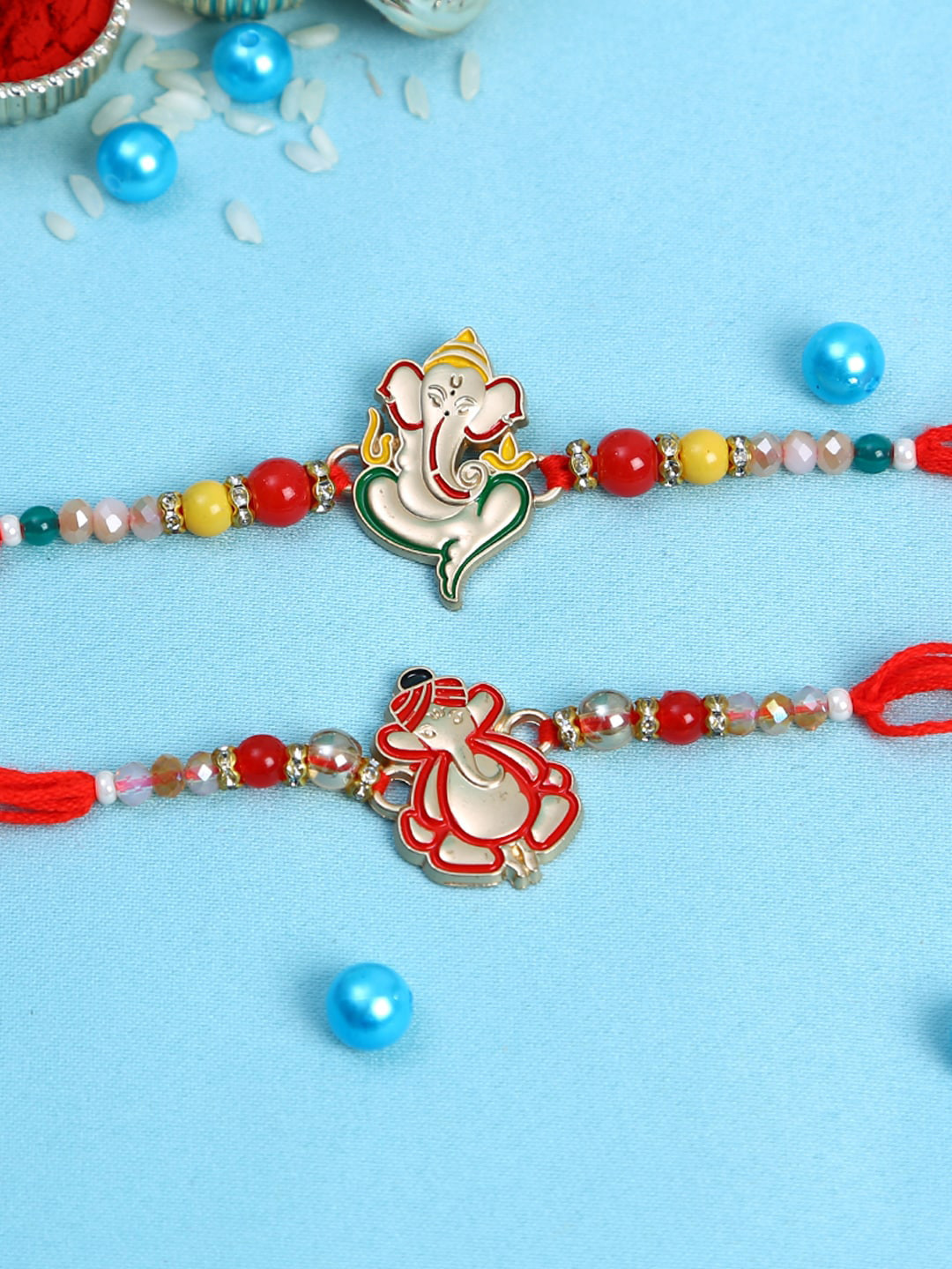 

Aapno Rajasthan Set of 2 Ganesh Rakhis, Multi