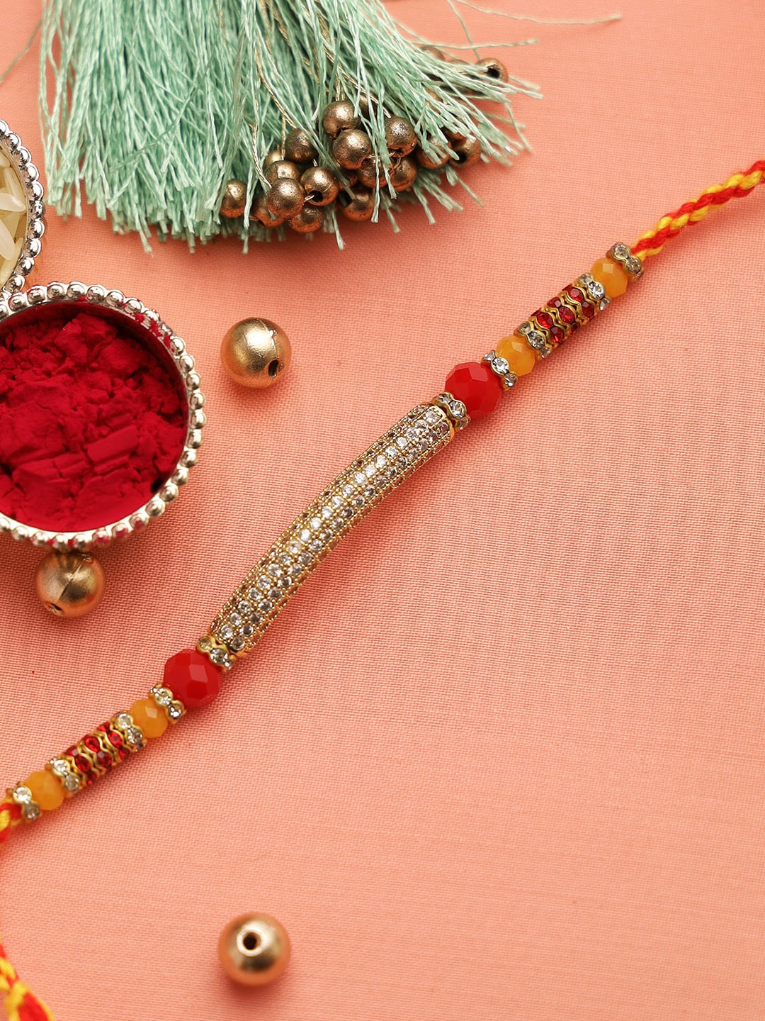 

Aapno Rajasthan Gold-Toned & Red American Diamond Rakhi Set