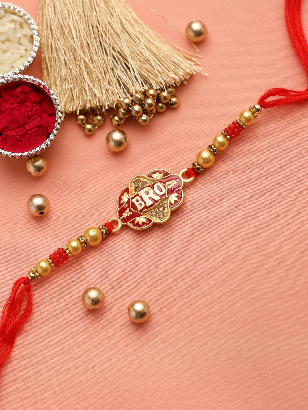 

Aapno Rajasthan Red & Gold-Toned BRO Charm Rakhi with Beads