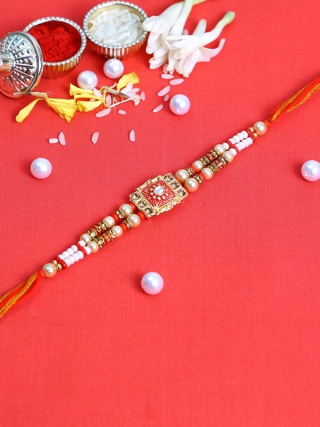 

Aapno Rajasthan Red & White Kundan Studded Meenakari Work Rakhi