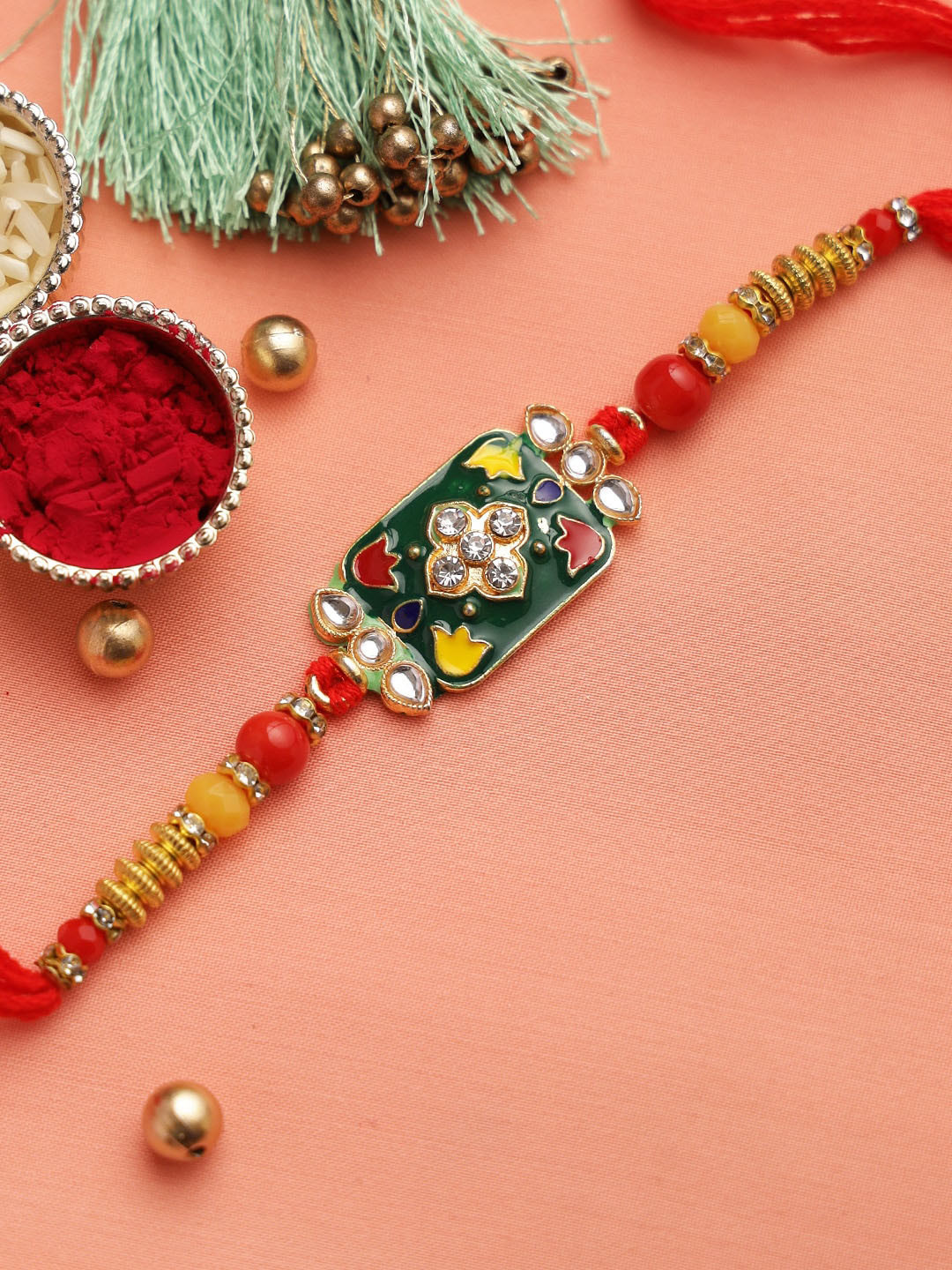 

Aapno Rajasthan Yellow & Green Traditional Kundan & Meenawork Jewelled Rakhi