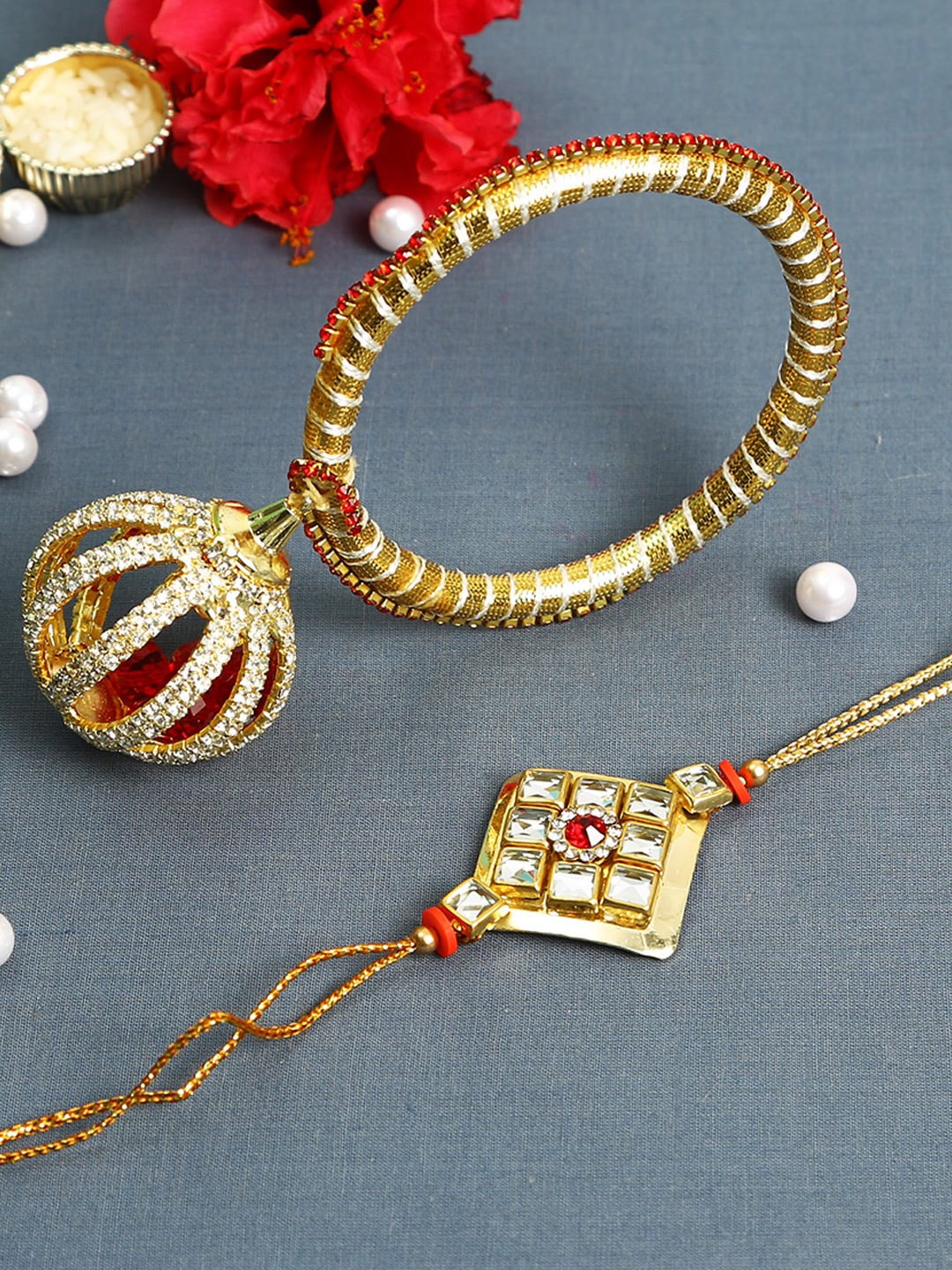 

Aapno Rajasthan Set of 2 Gold-Toned Traditional Bhaiya Bhabhi Rakhi with Kundan Work