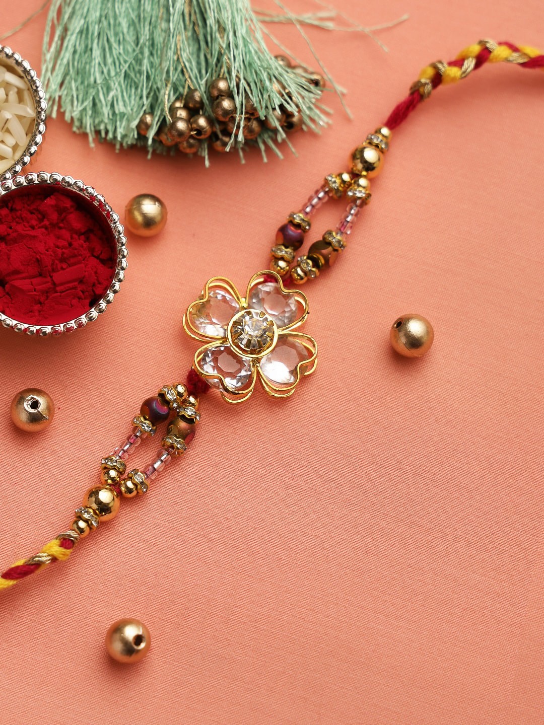 Aapno Rajasthan Gold Toned & Red Kundan Beaded Circular Thread Rakhi