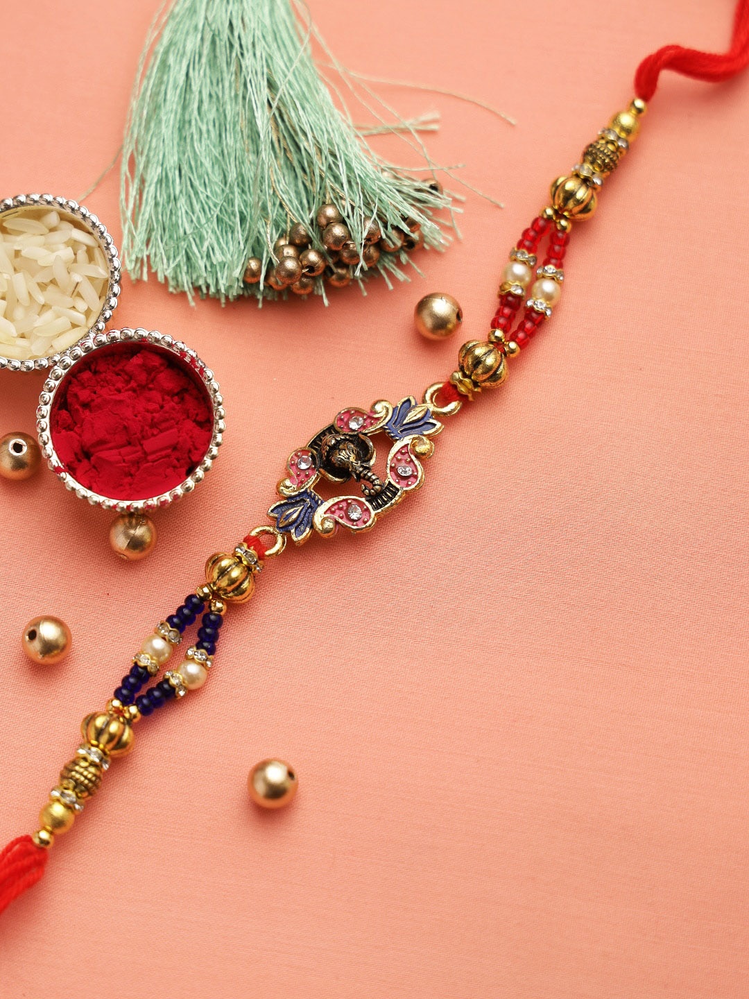 

Aapno Rajasthan Multicoloured Beaded Lord Ganesha Meenakari Rakhi, Multi