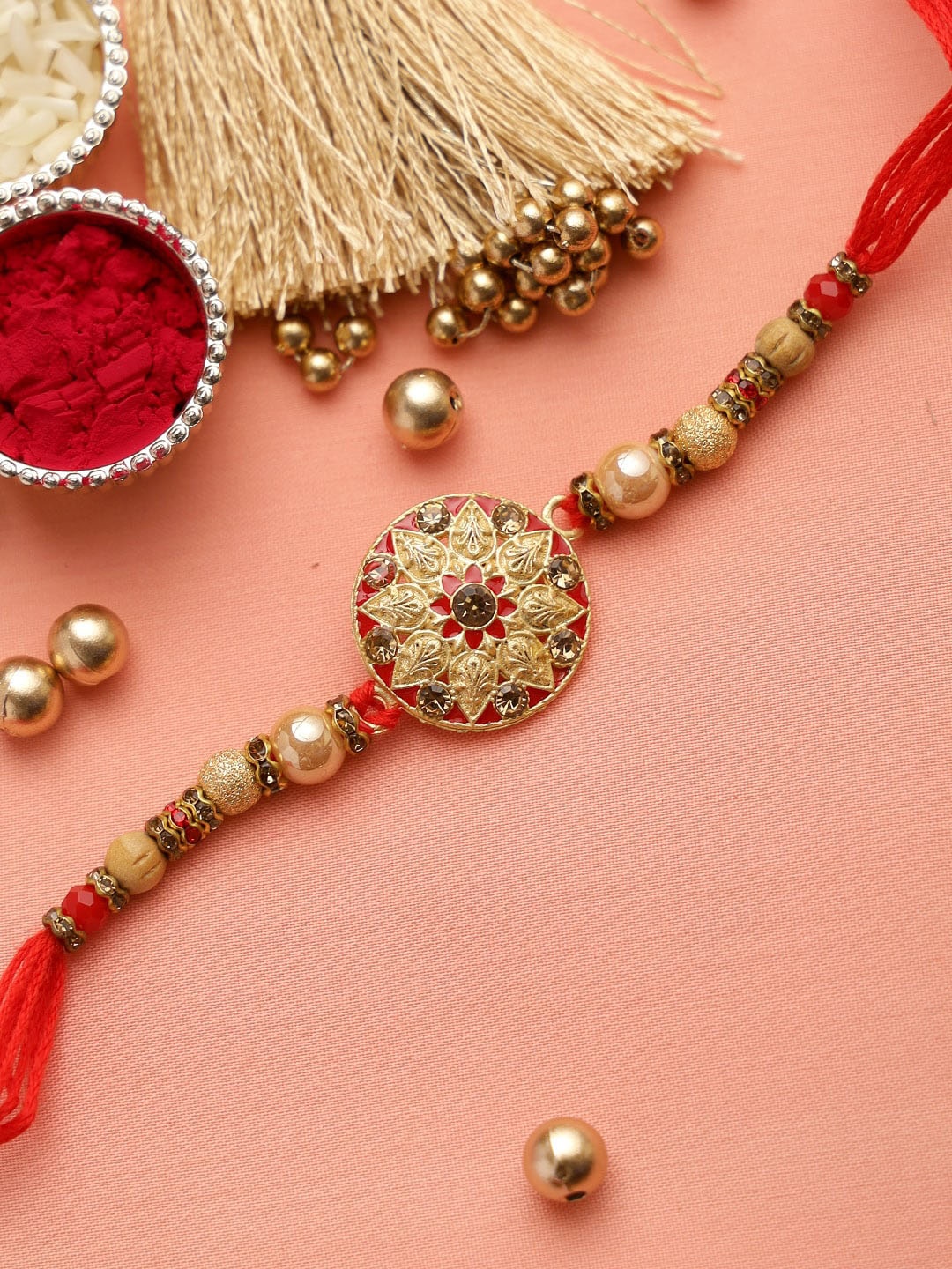 

Aapno Rajasthan Gold-Toned & Red Meenakari Floral Rakhi