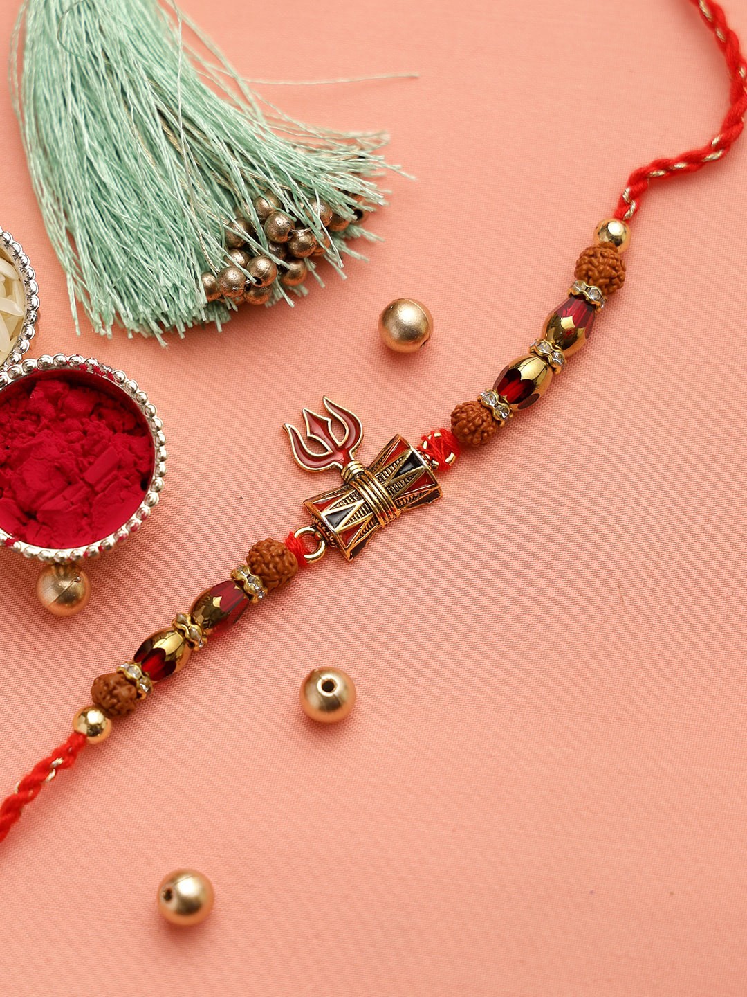

Aapno Rajasthan Red & Gold-Toned Rudraksh Beaded Rakhi